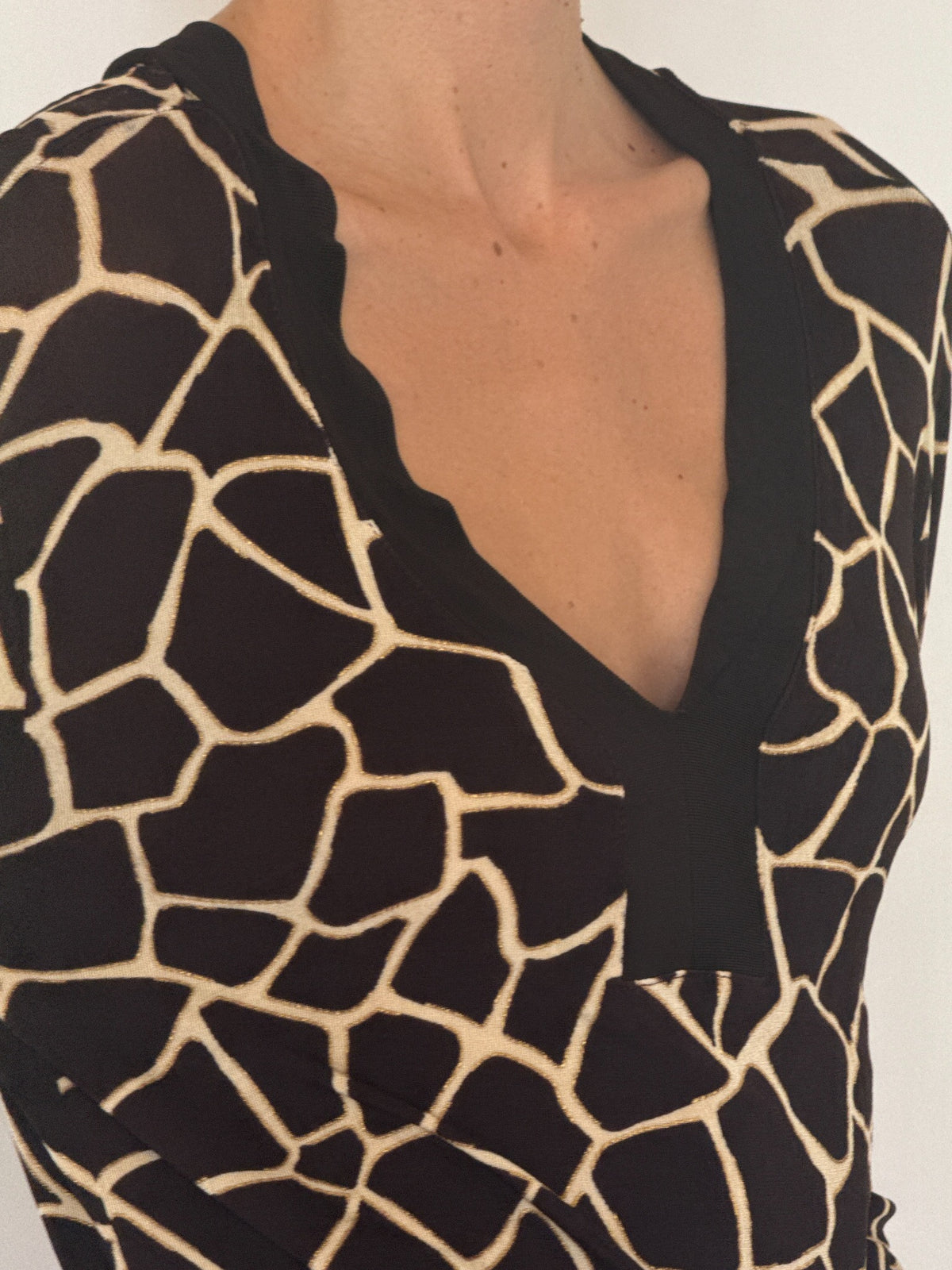 Black and cream abstract animal print V-neck long tunic top