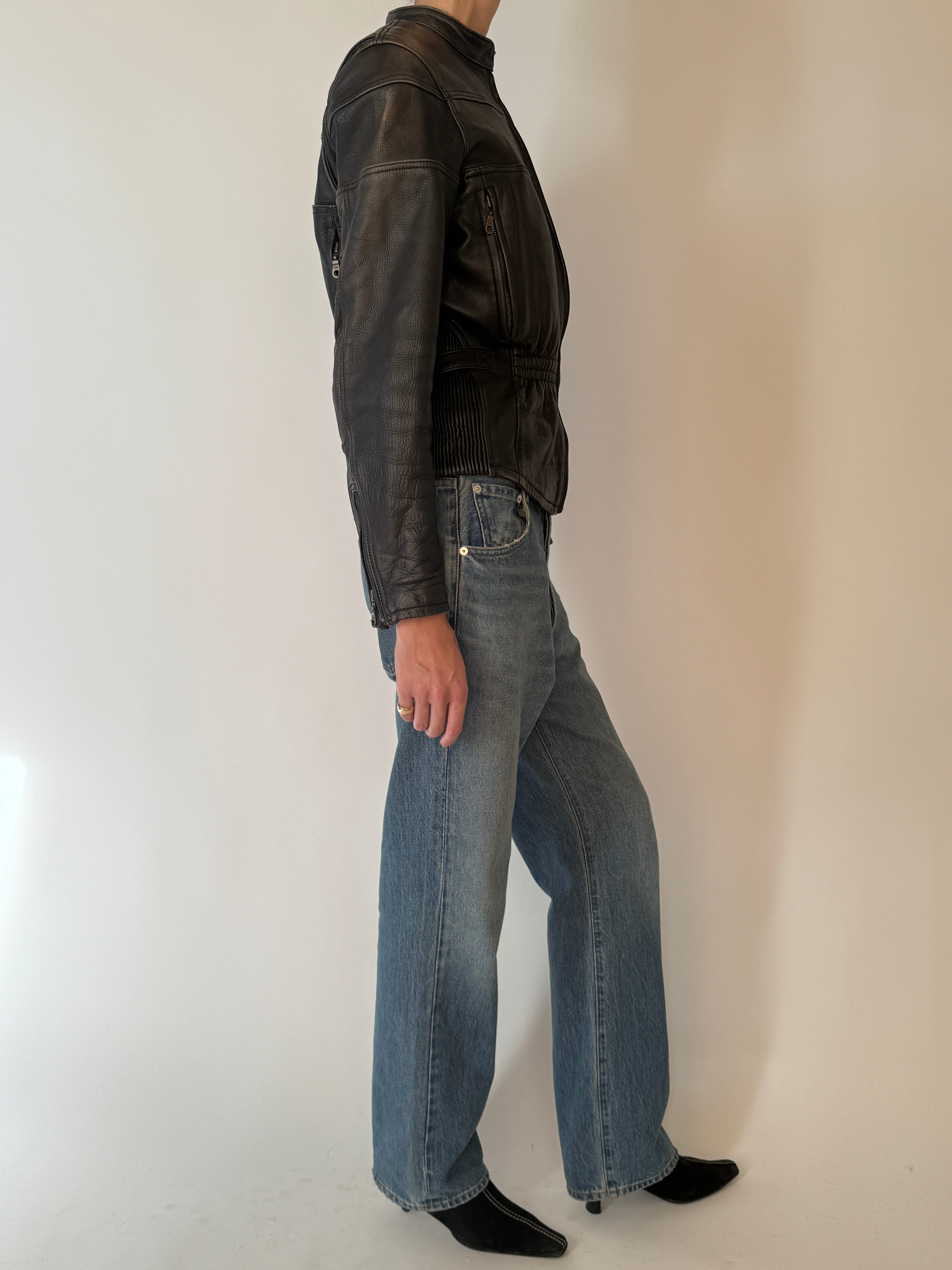 Vintage black leather zip jacket side view