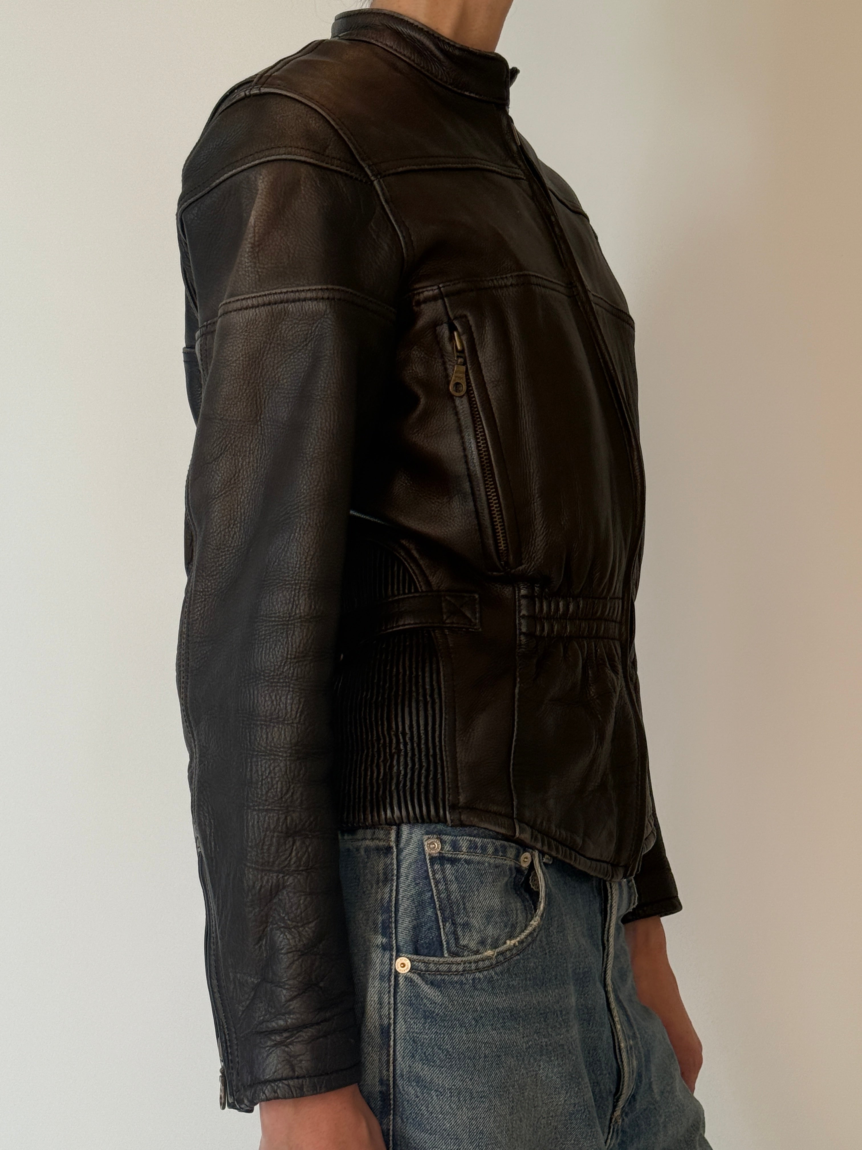 Vintage black leather zip jacket side view