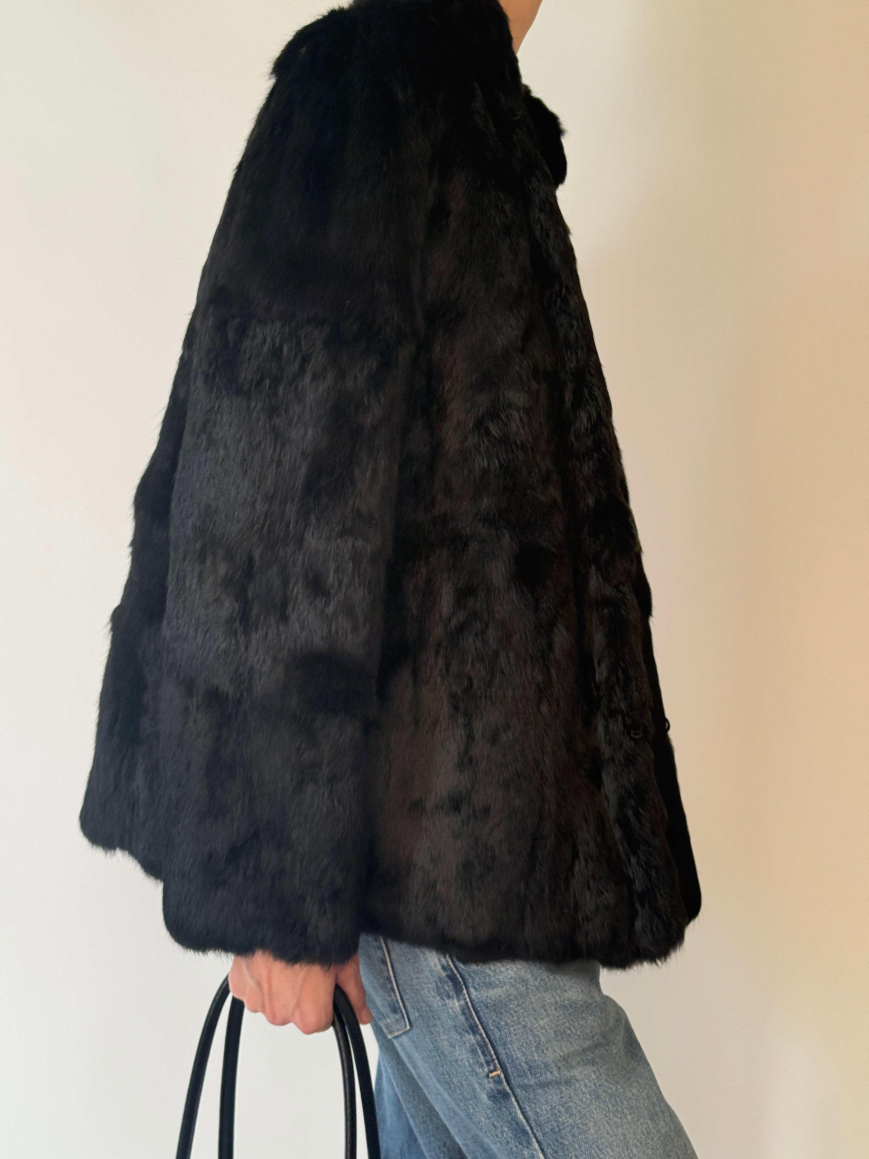 Vintage black fur jacket side profile