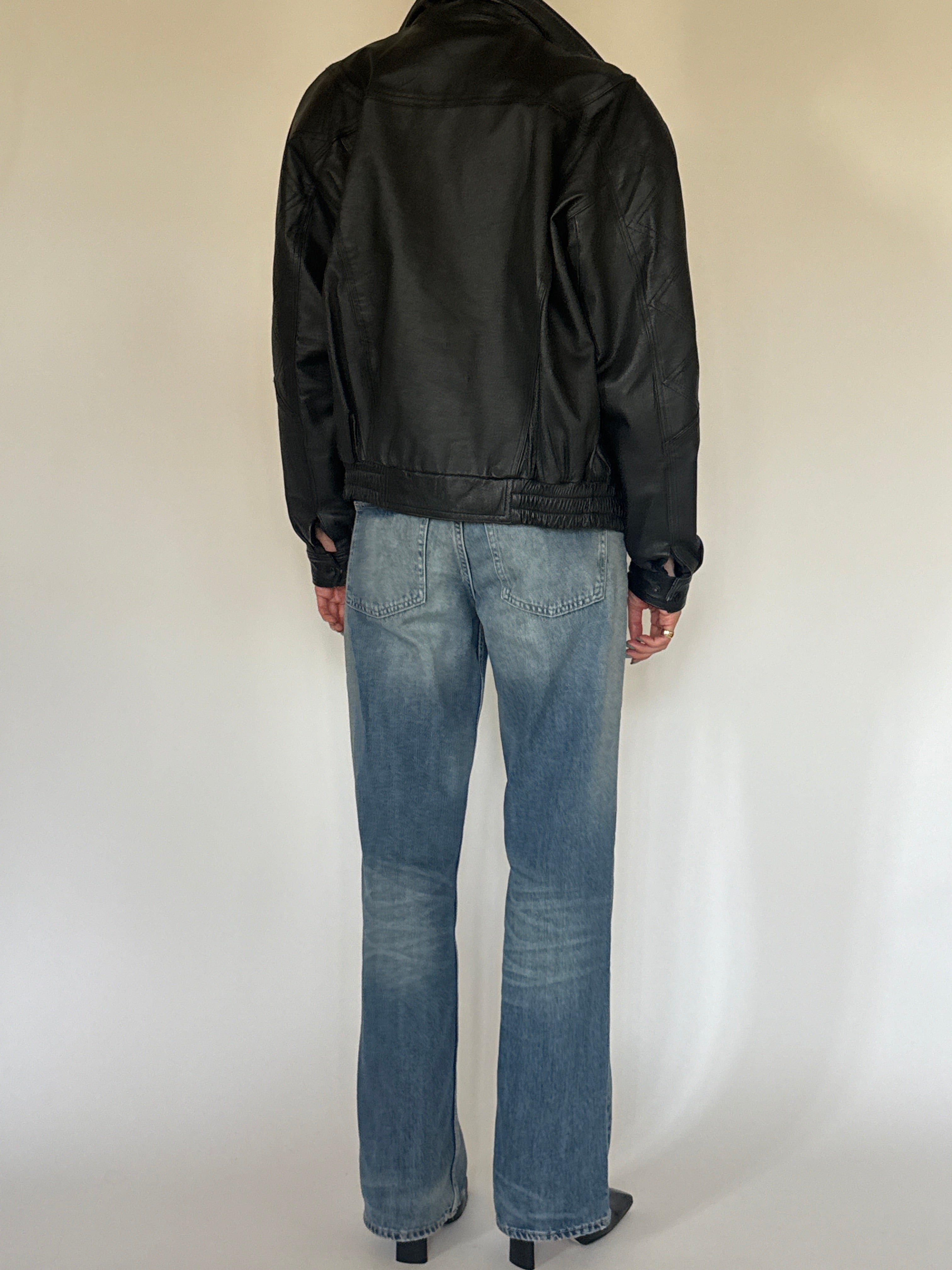 Vintage oversized black leather bomber jacket back view