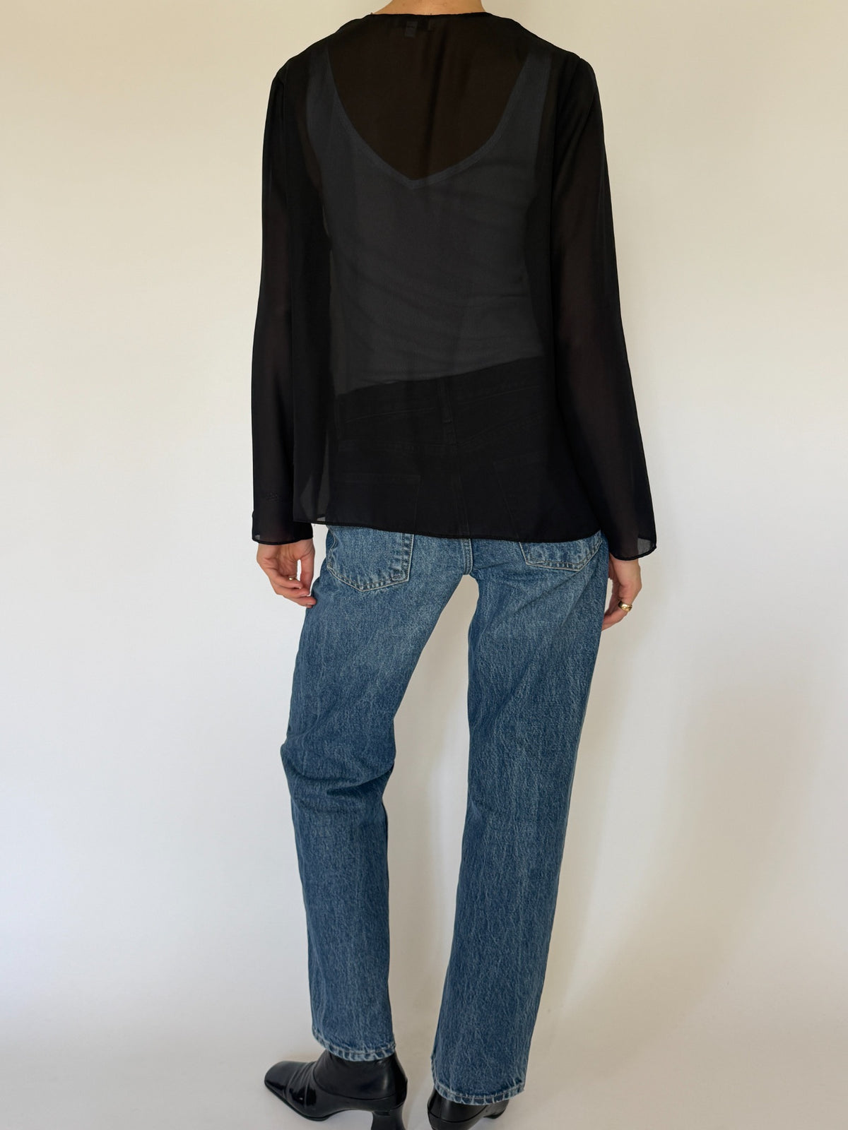 Vintage sheer black open-front jacket back view