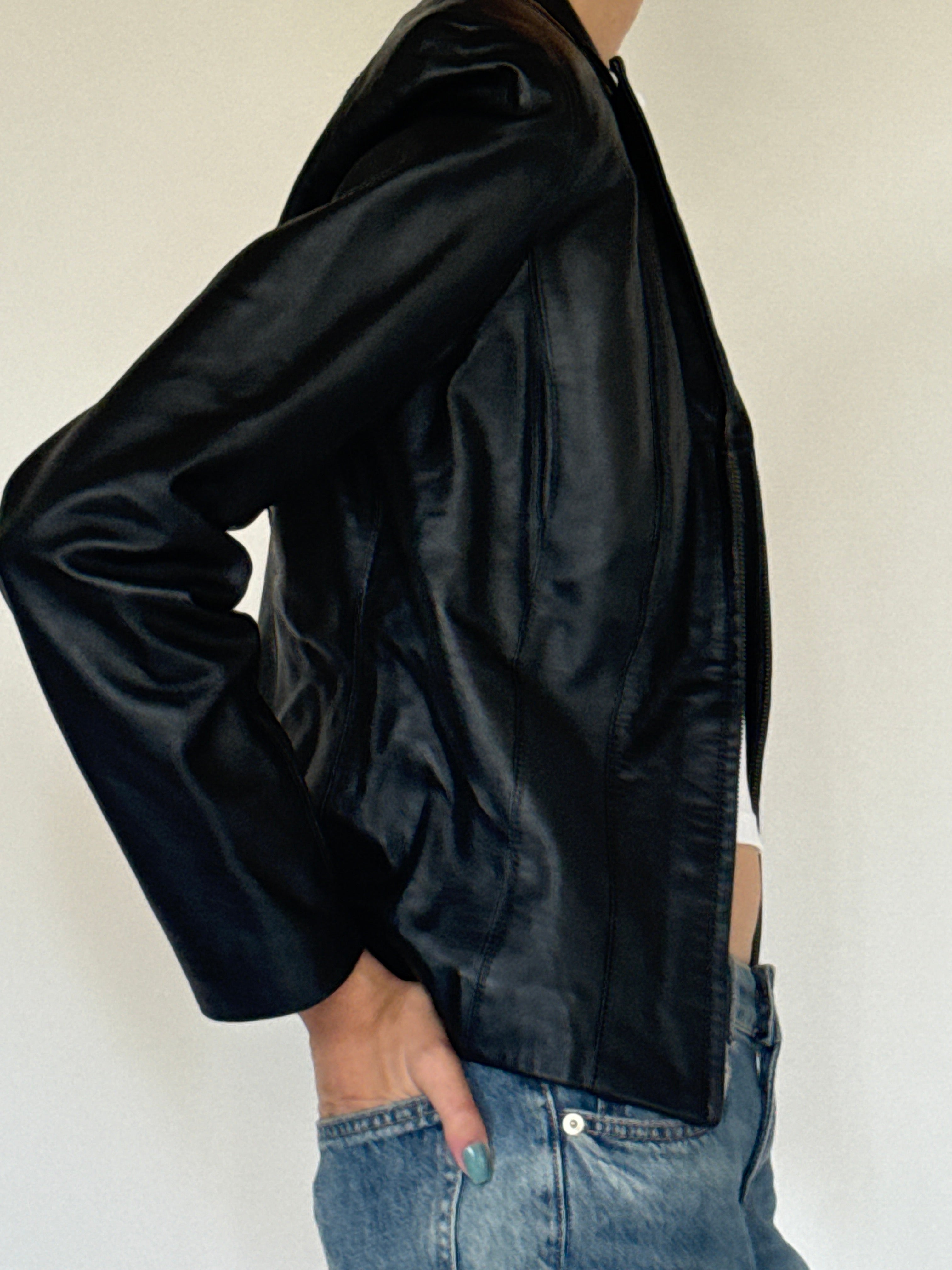 Vintage black leather jacket side view