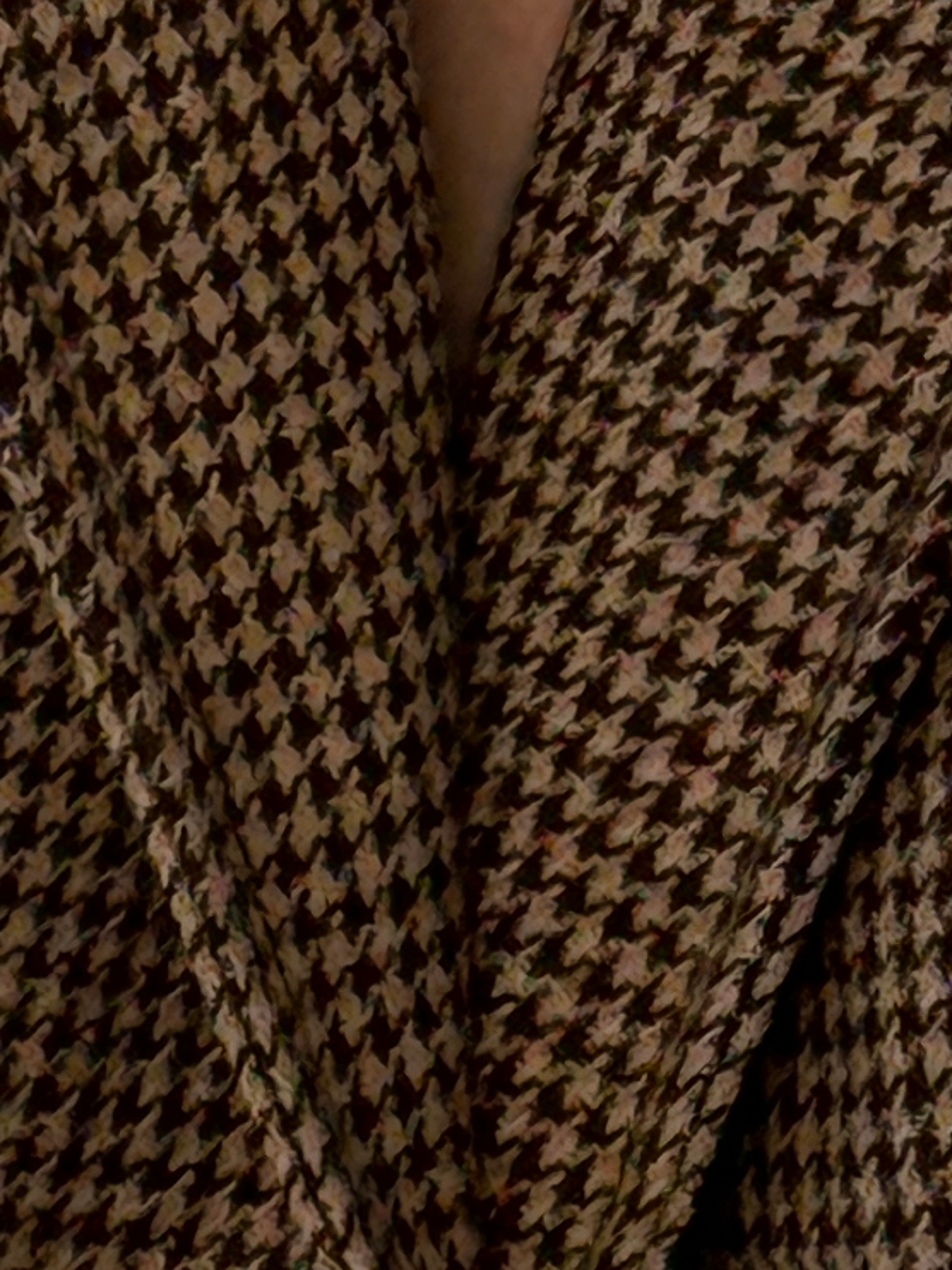 Vintage brown houndstooth blazer fabric close-up