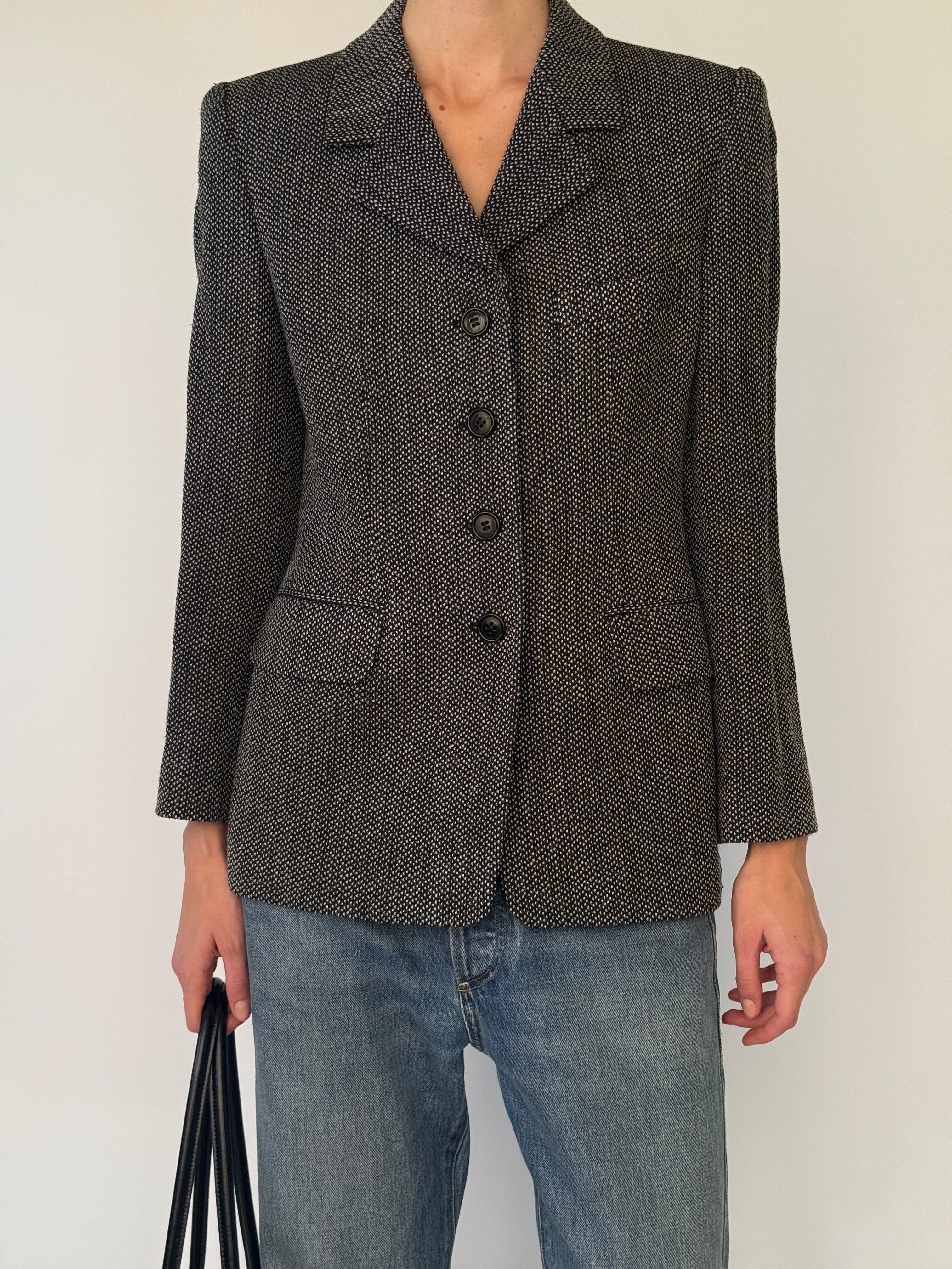 Vintage charcoal blazer showing structured shoulders