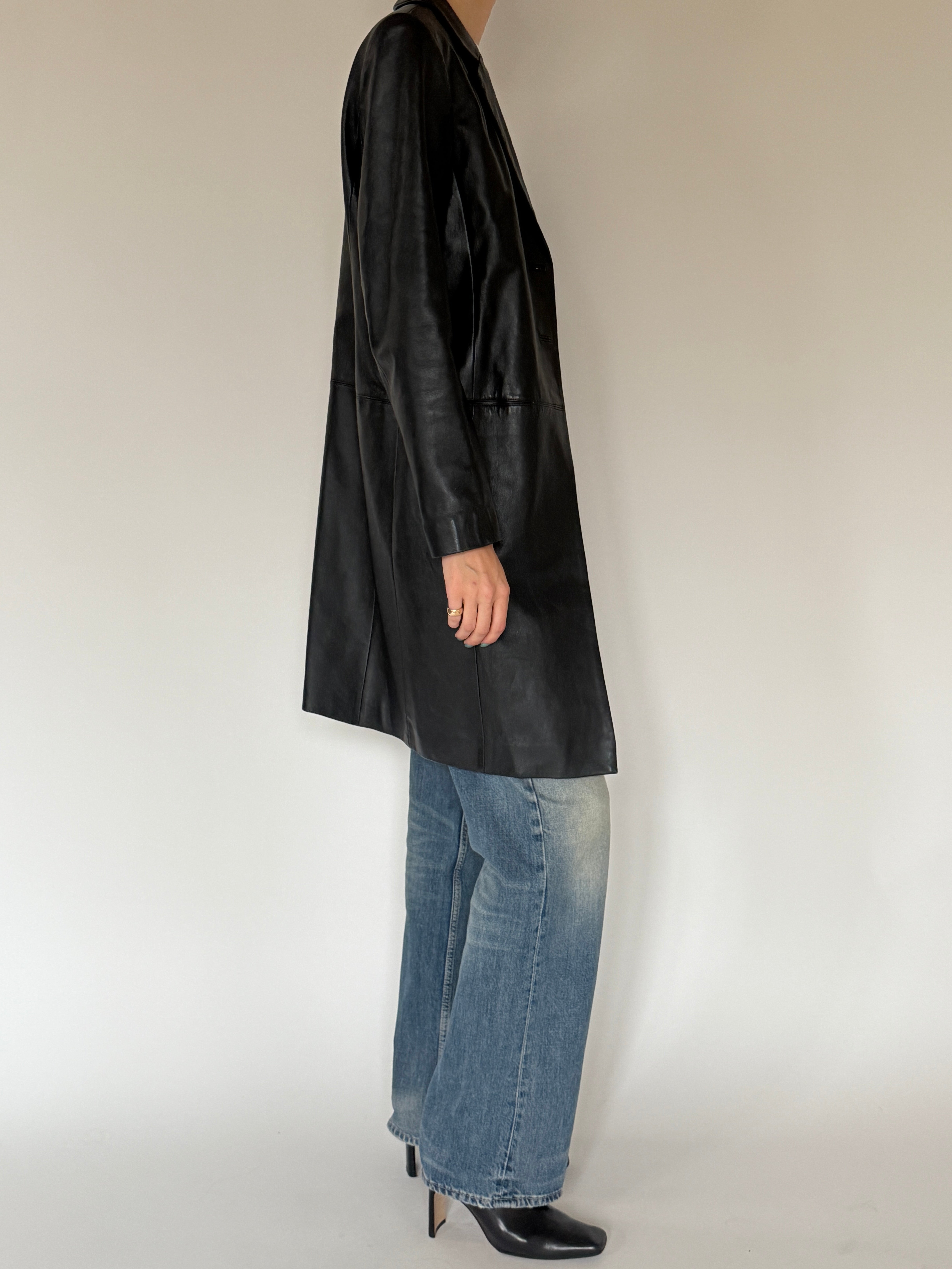 Vintage black longline leather jacket side view