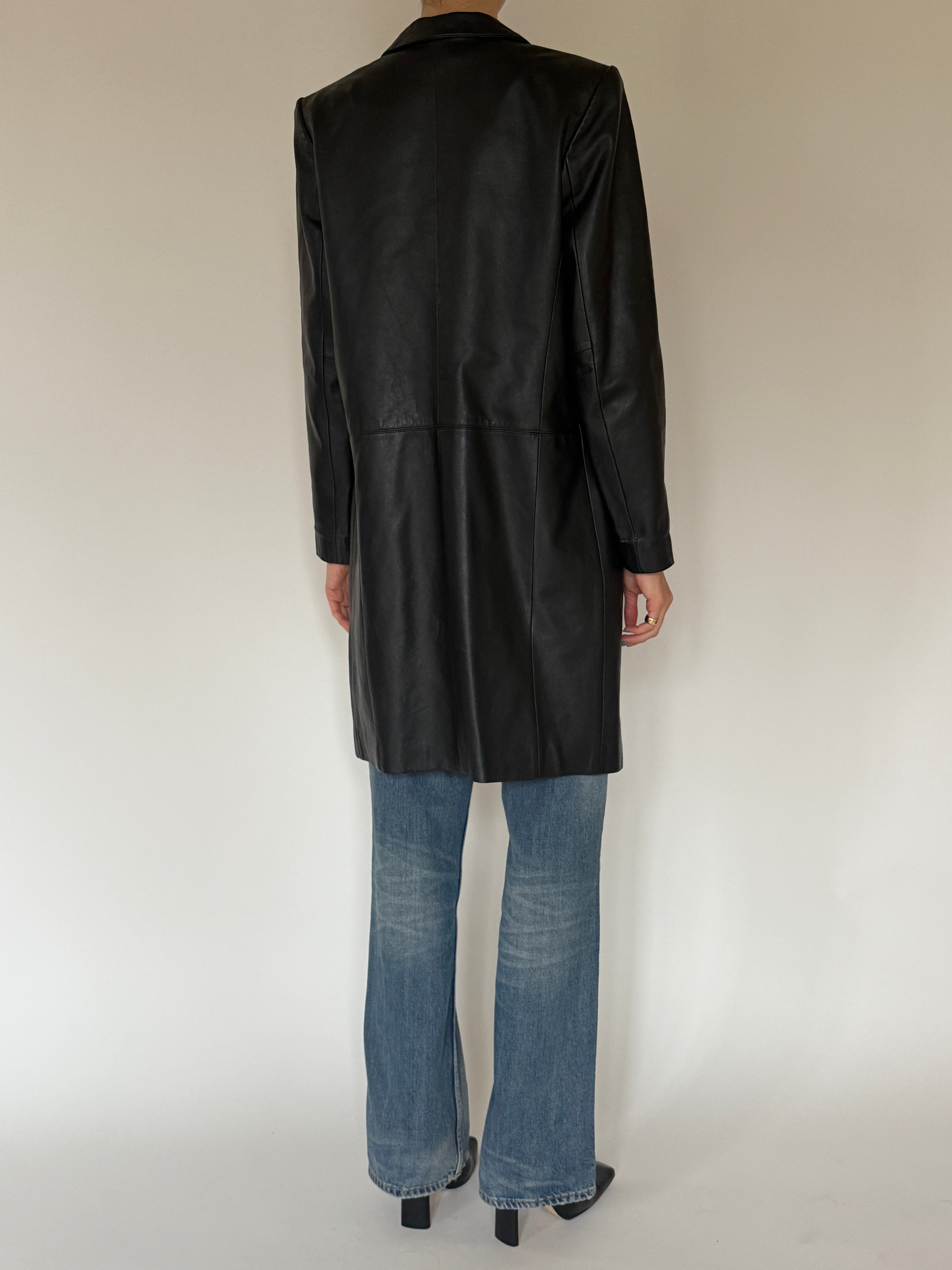 Vintage black leather jacket back view