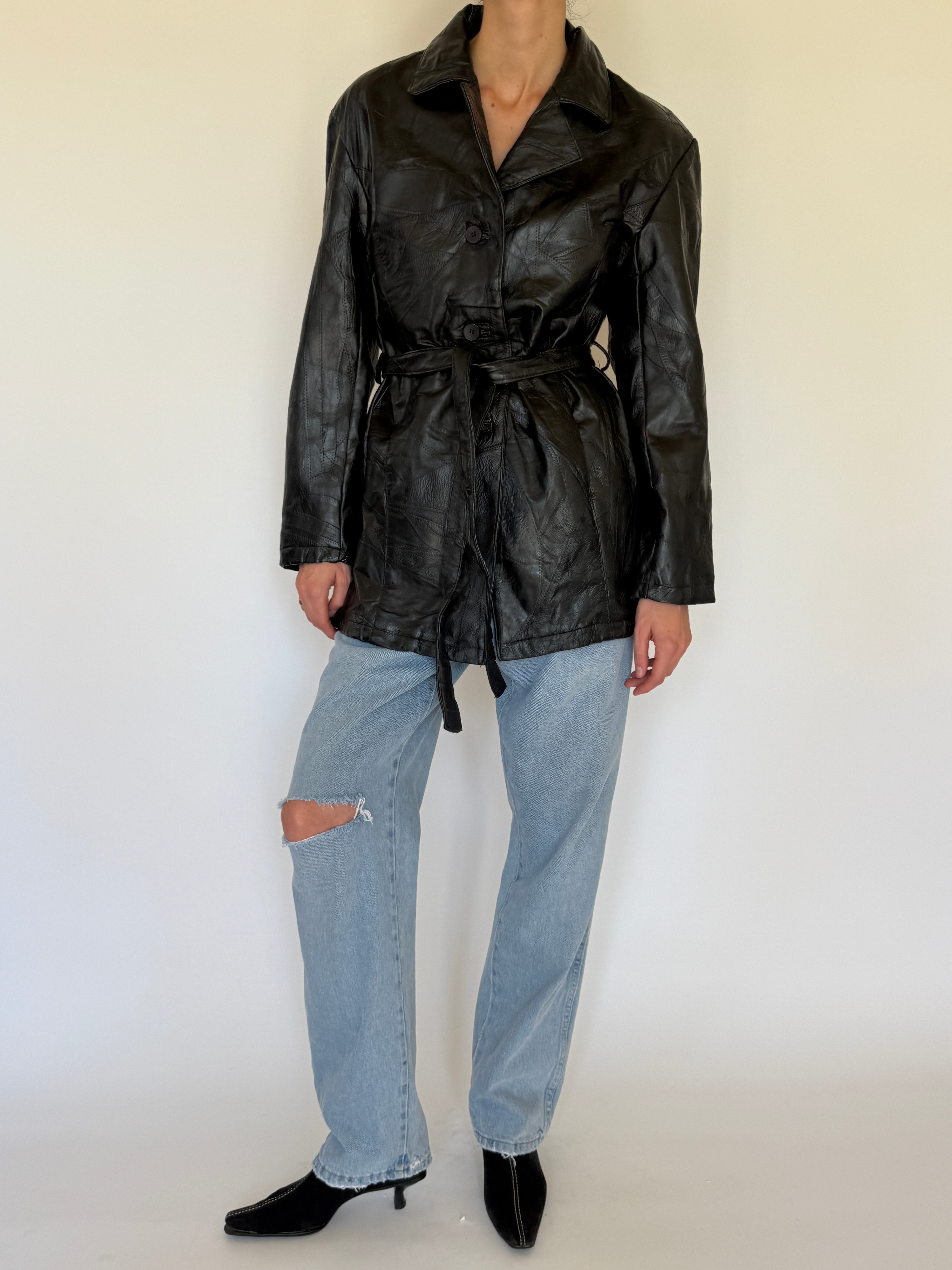 Vintage patchwork leather jacket black pocket area detail