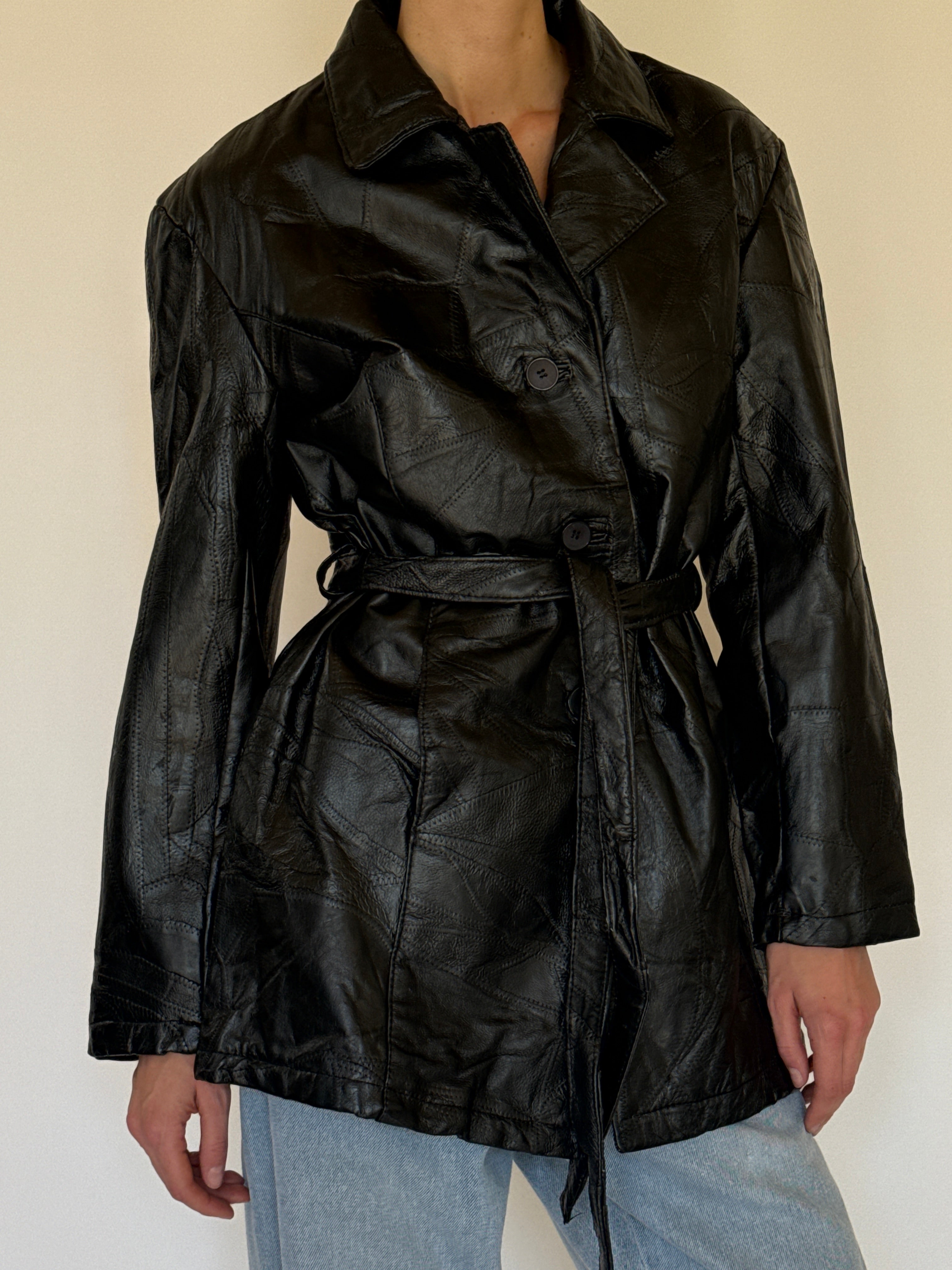 Vintage patchwork leather belted jacket black front view