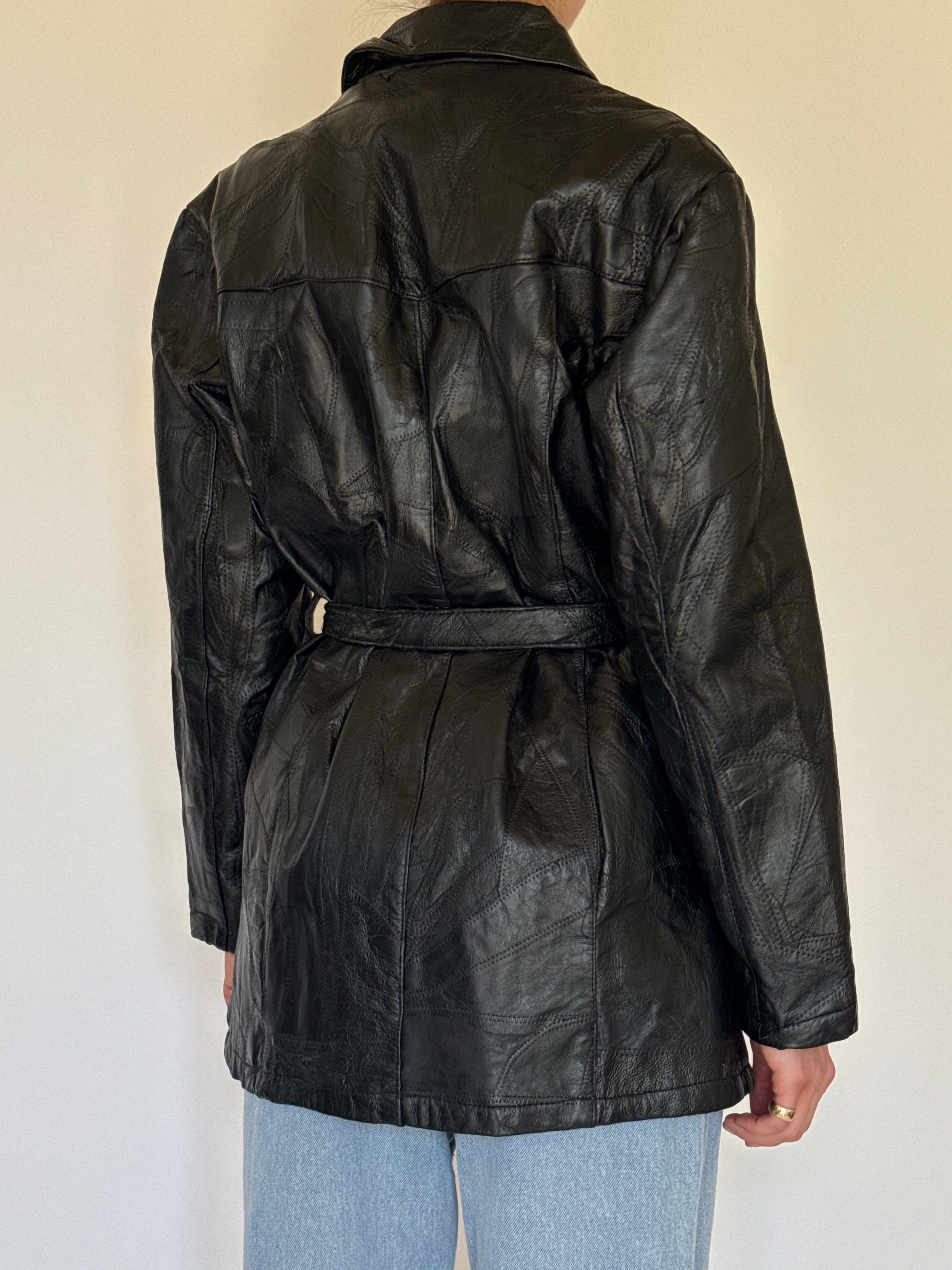 Vintage patchwork leather belted jacket black back view