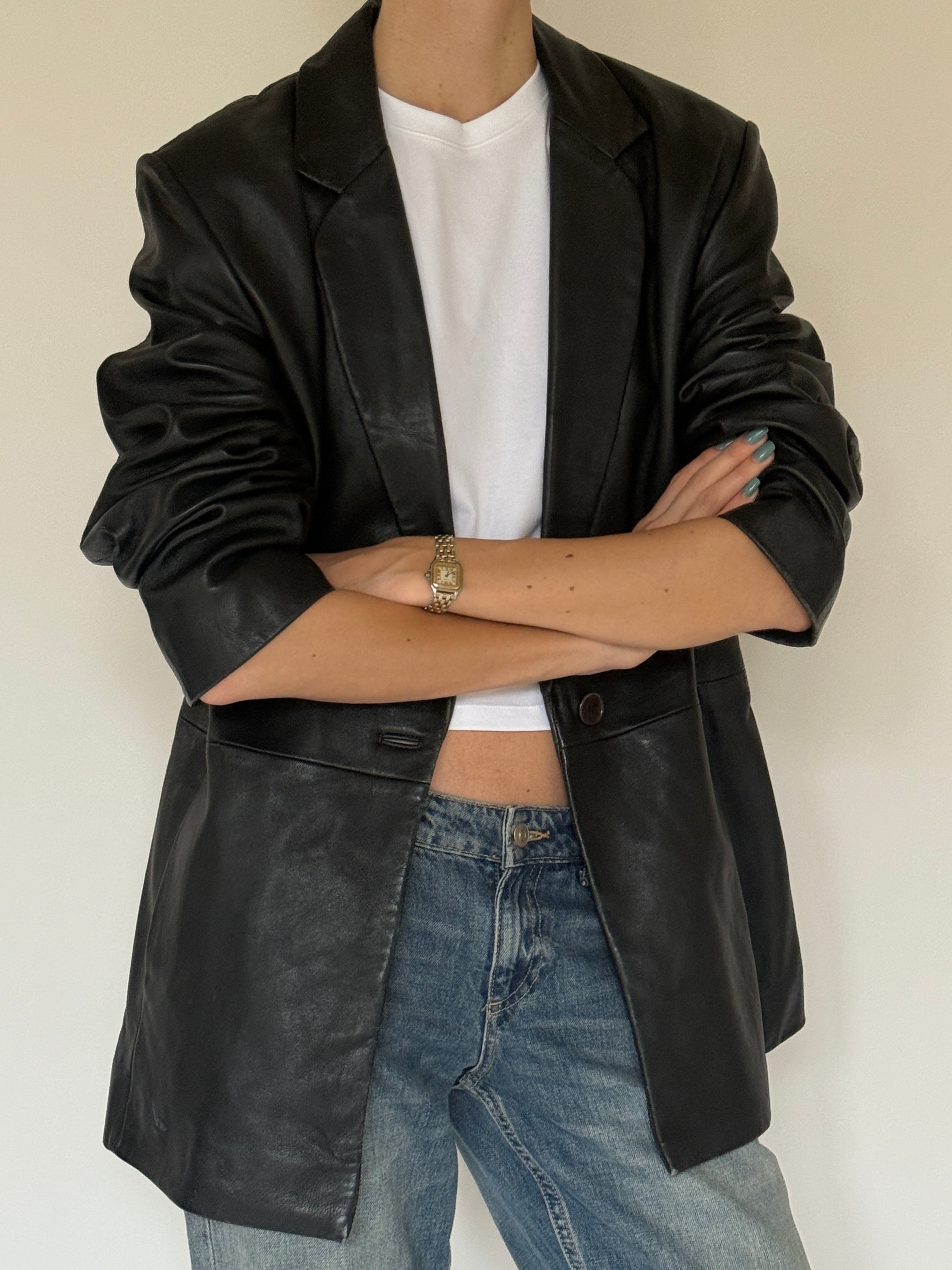 Vintage black leather blazer front view with single-button closure