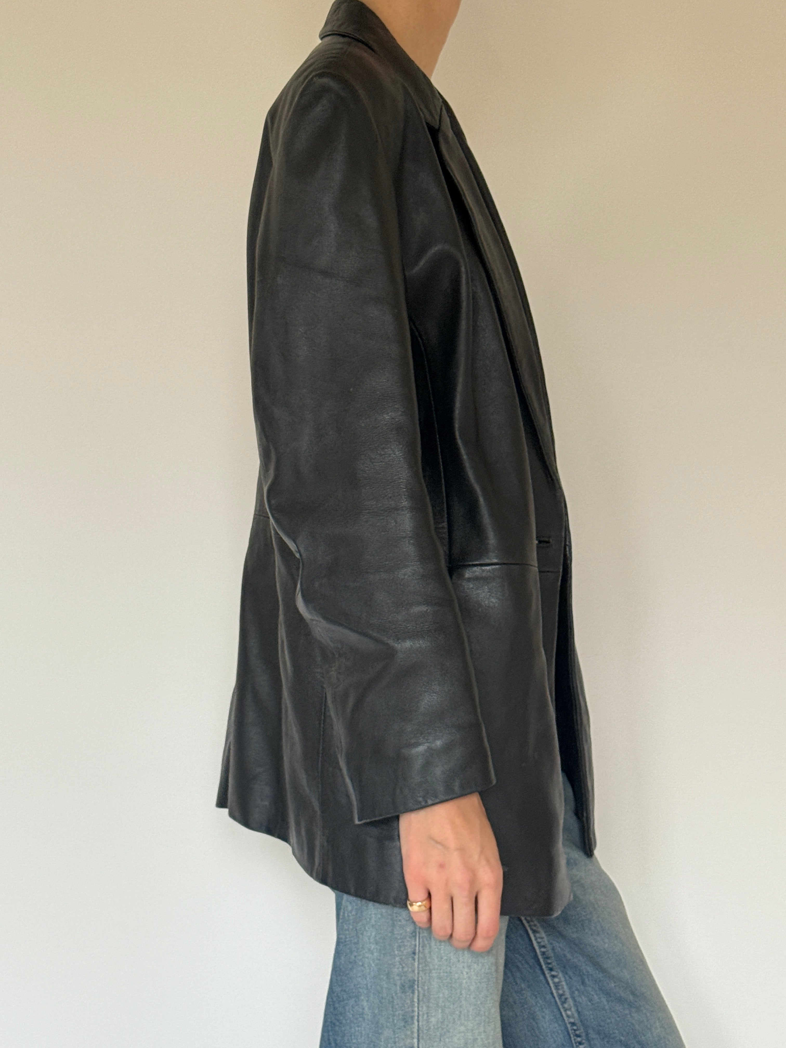 Vintage black leather blazer side view with relaxed fit