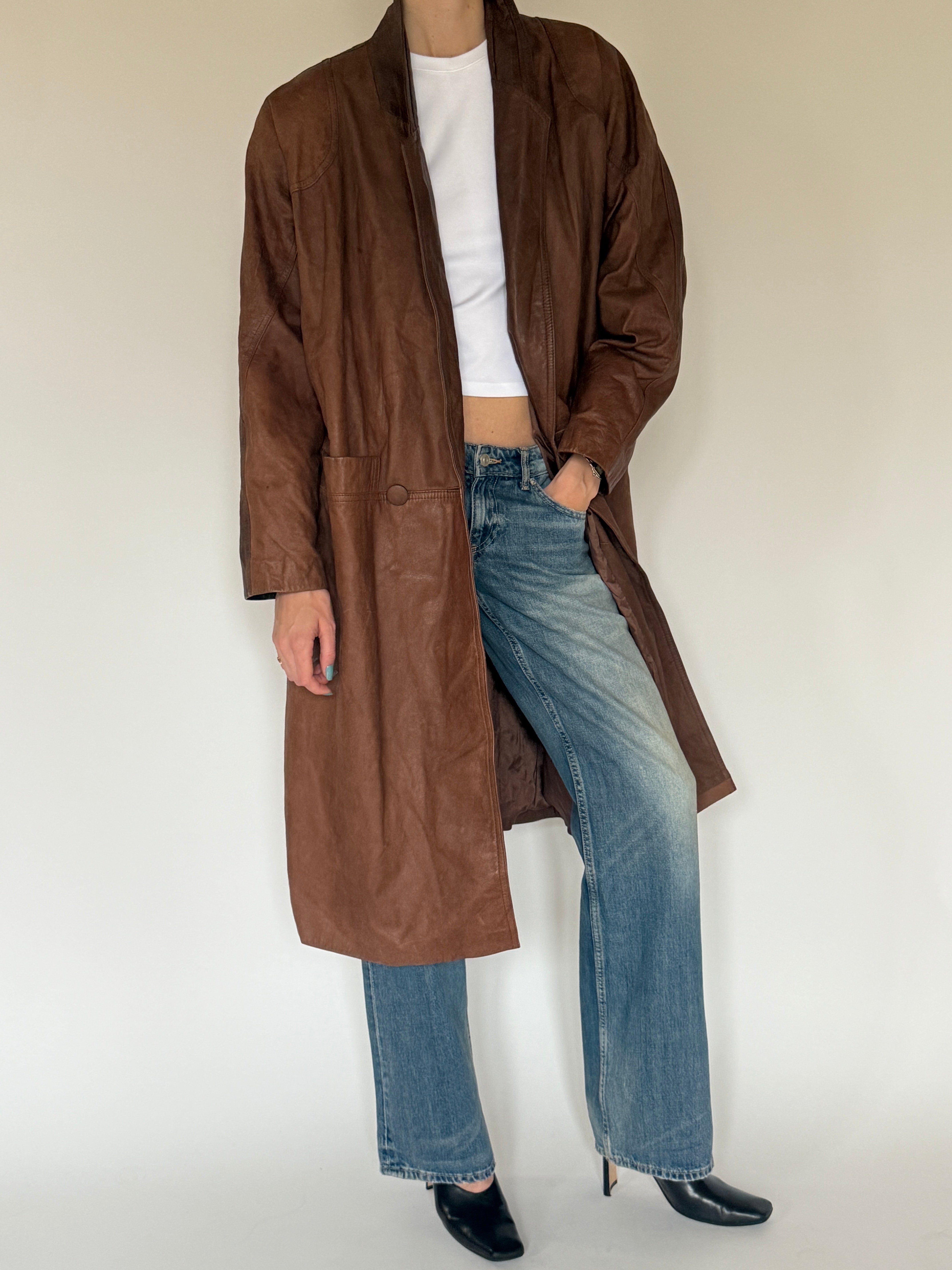 Vintage brown leather coat front view
