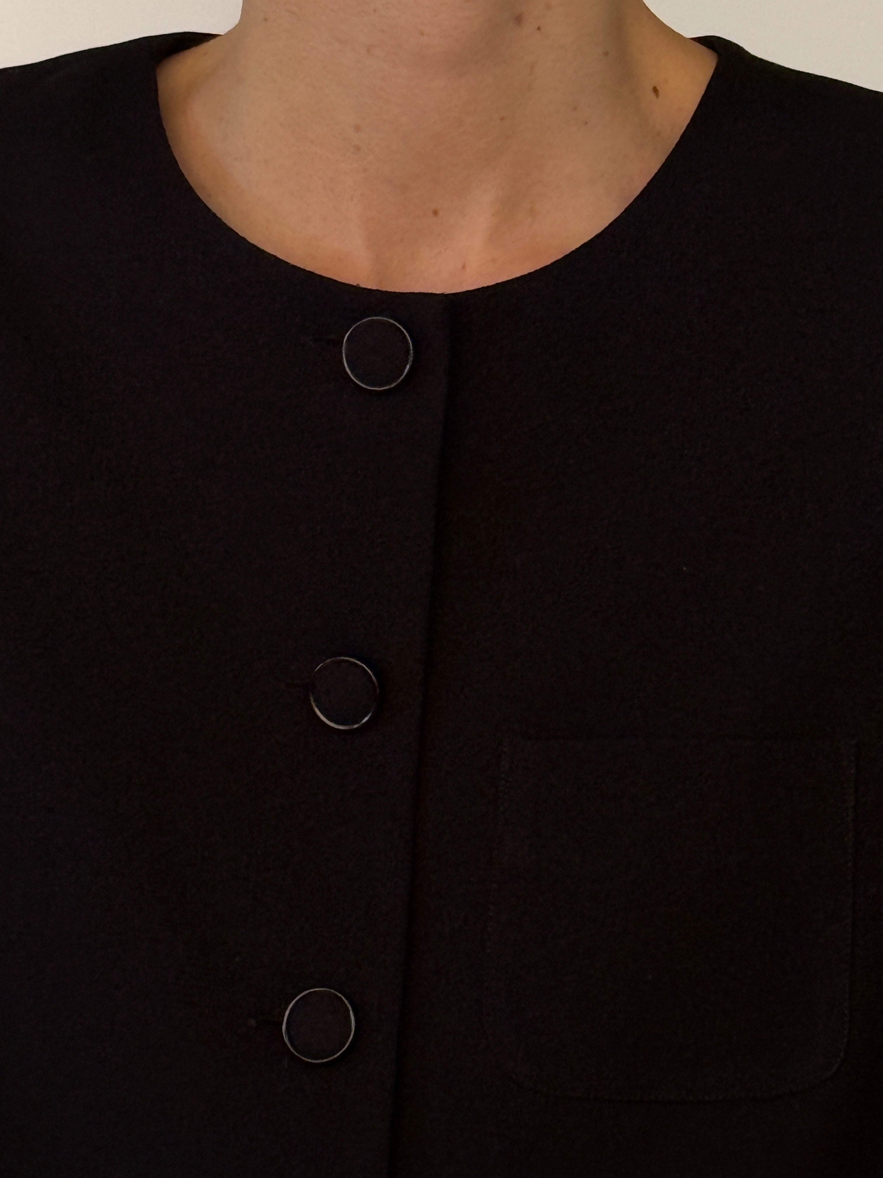 Vintage black collarless jacket button detail