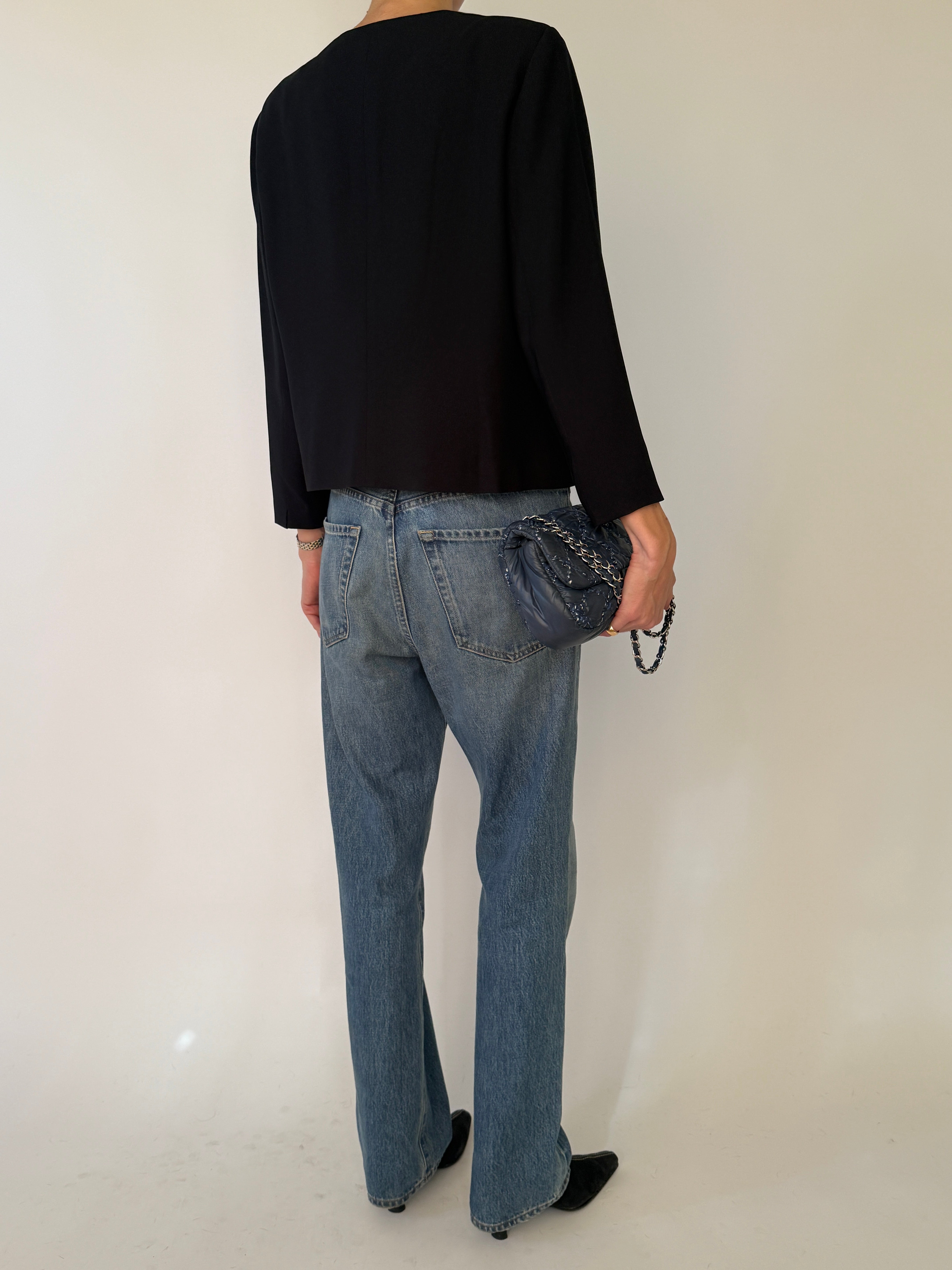 Vintage black collarless jacket back view