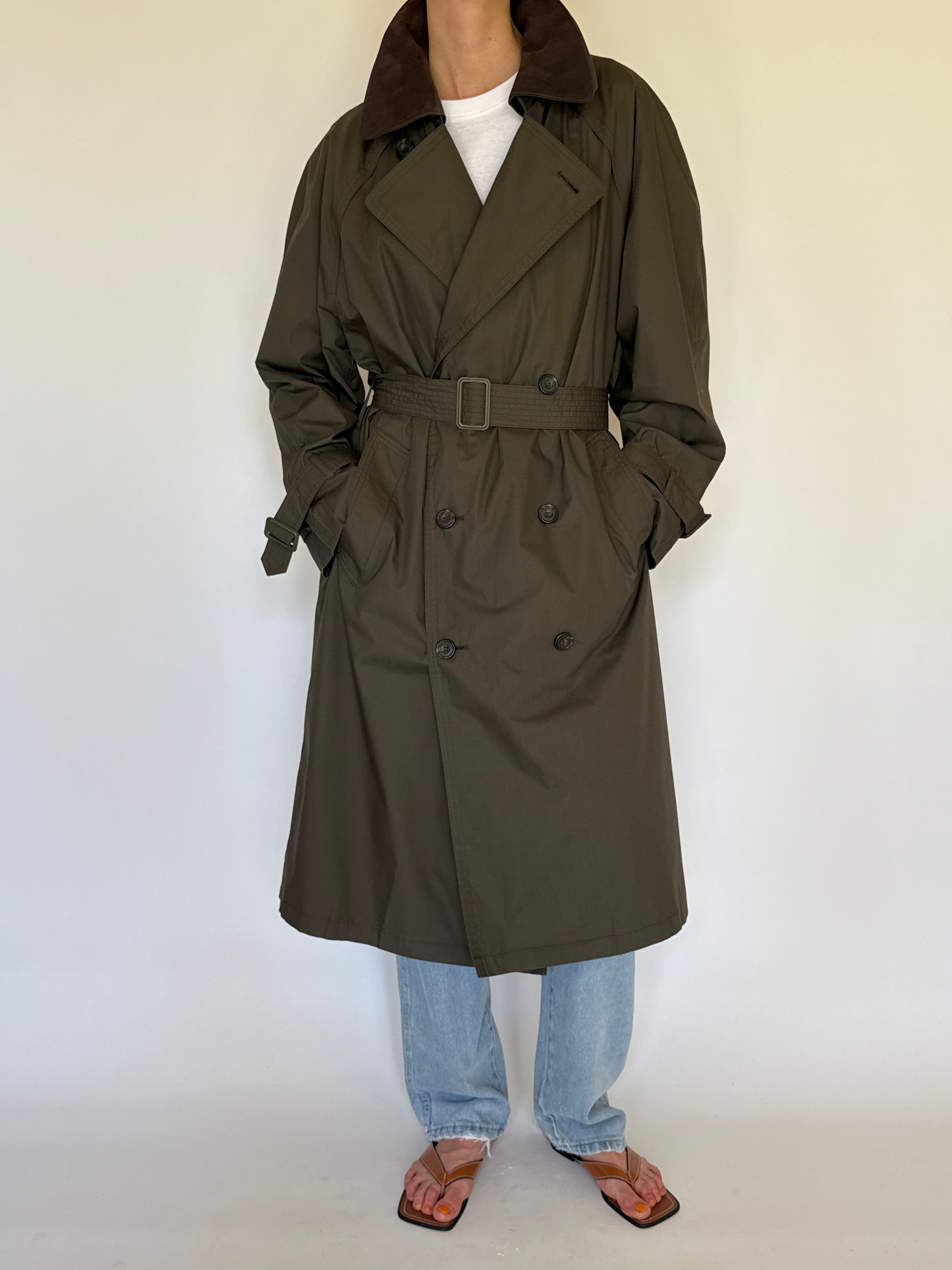 Vintage olive trench coat sleeve strap detail with buckle