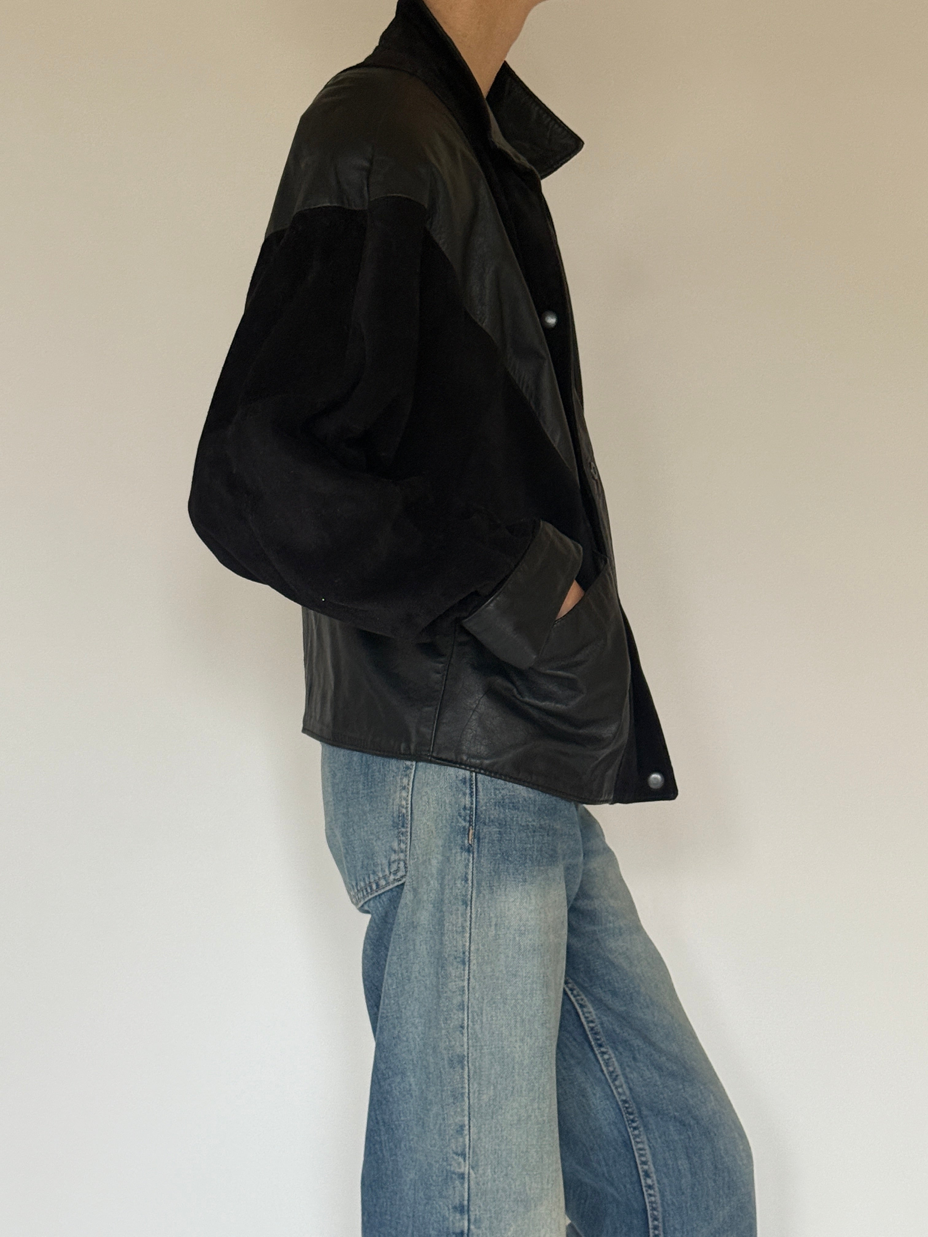 Vintage black suede and leather jacket side view