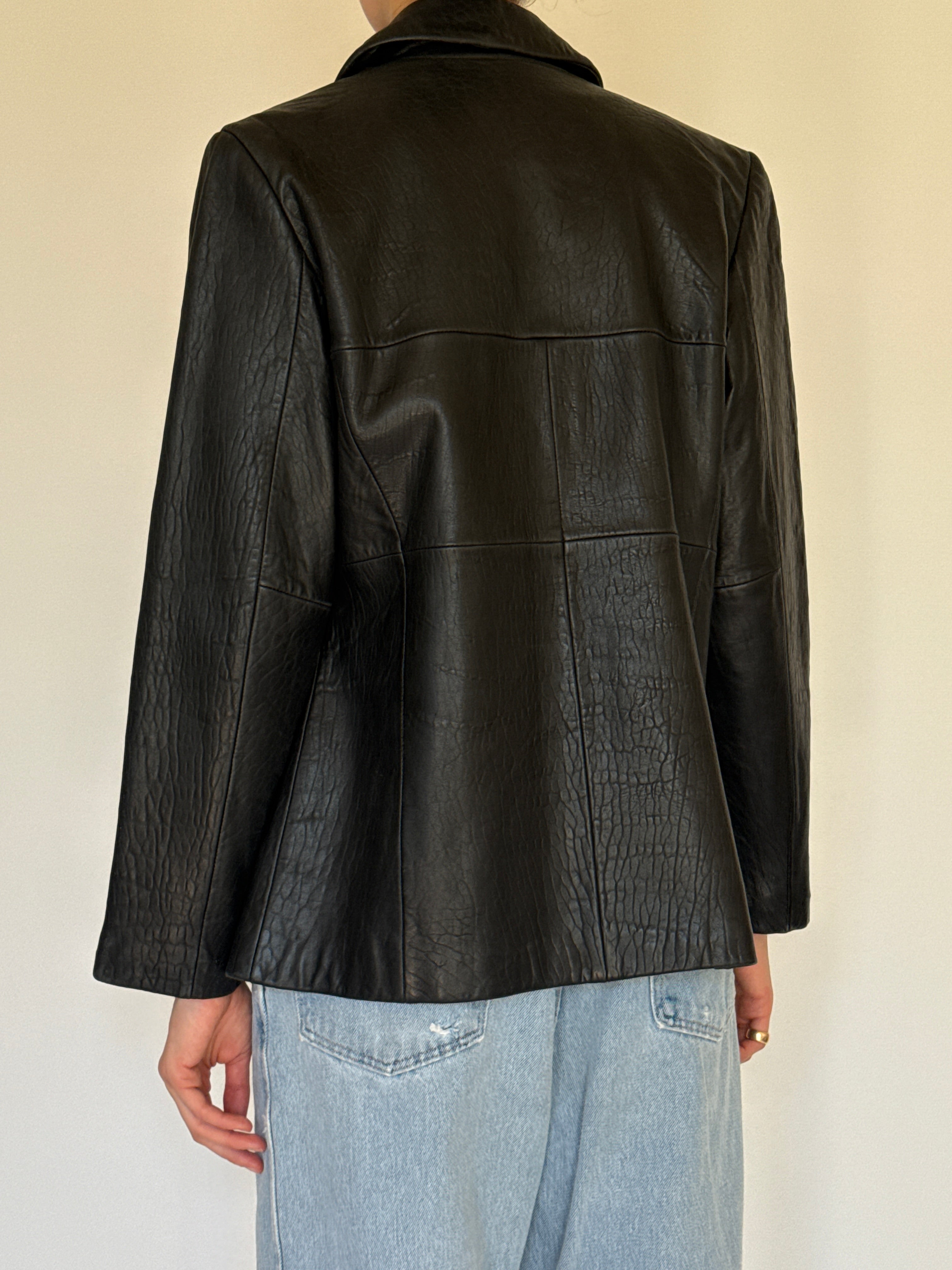 Vintage black leather jacket back view clean design