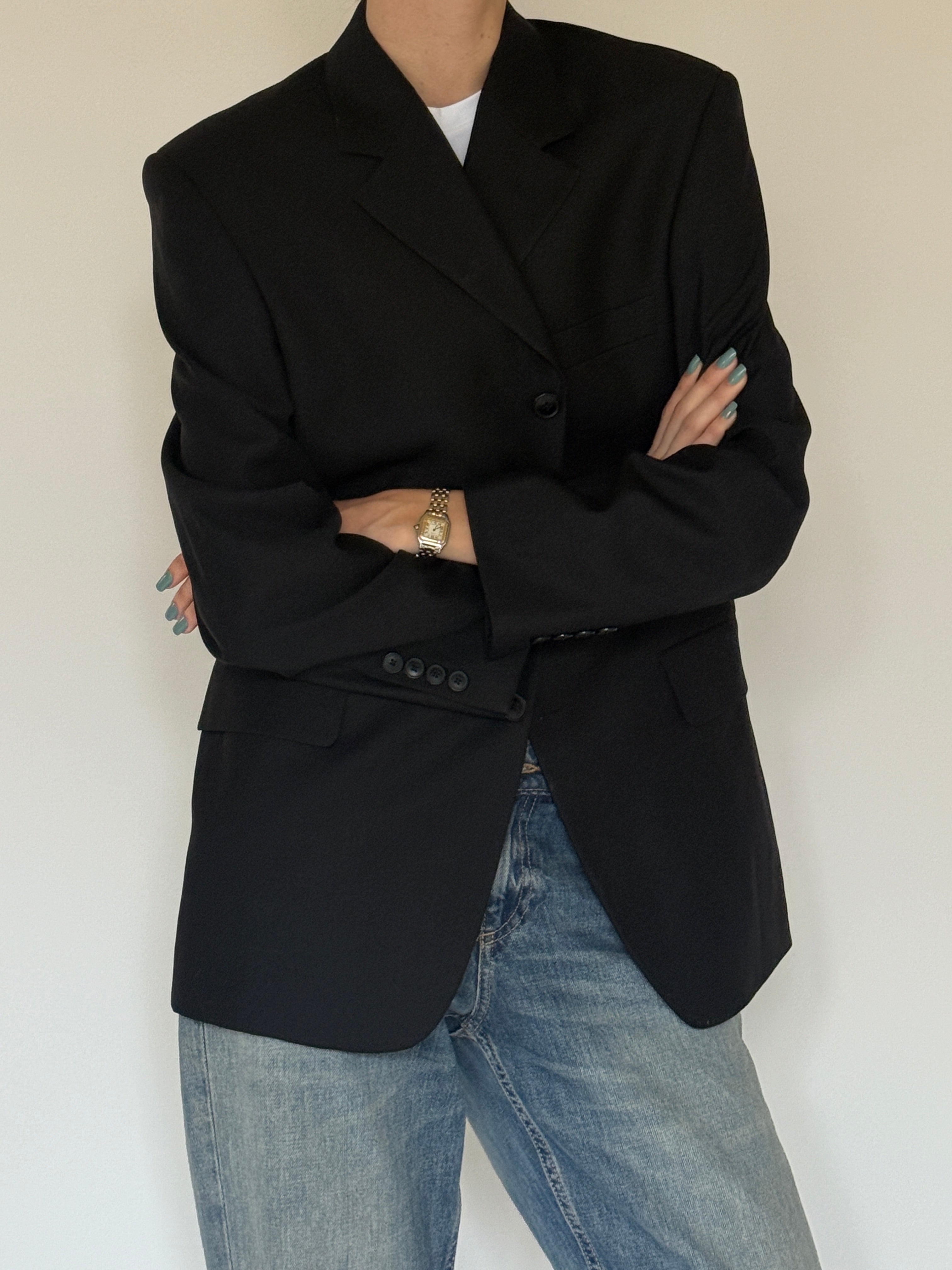 Vintage black blazer front view with tailored silhouette