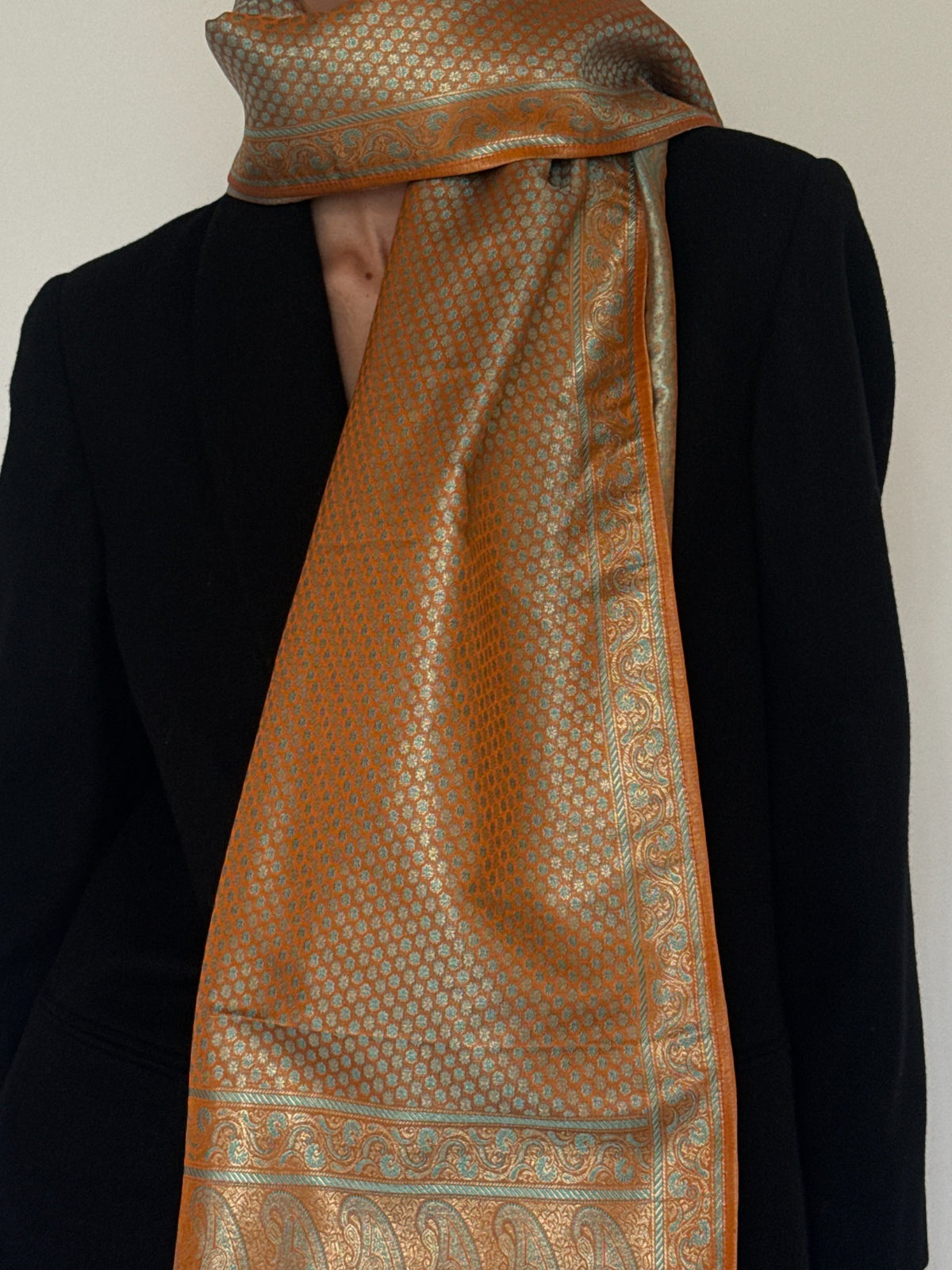 Vintage paisley scarf front view in burnt orange and aqua