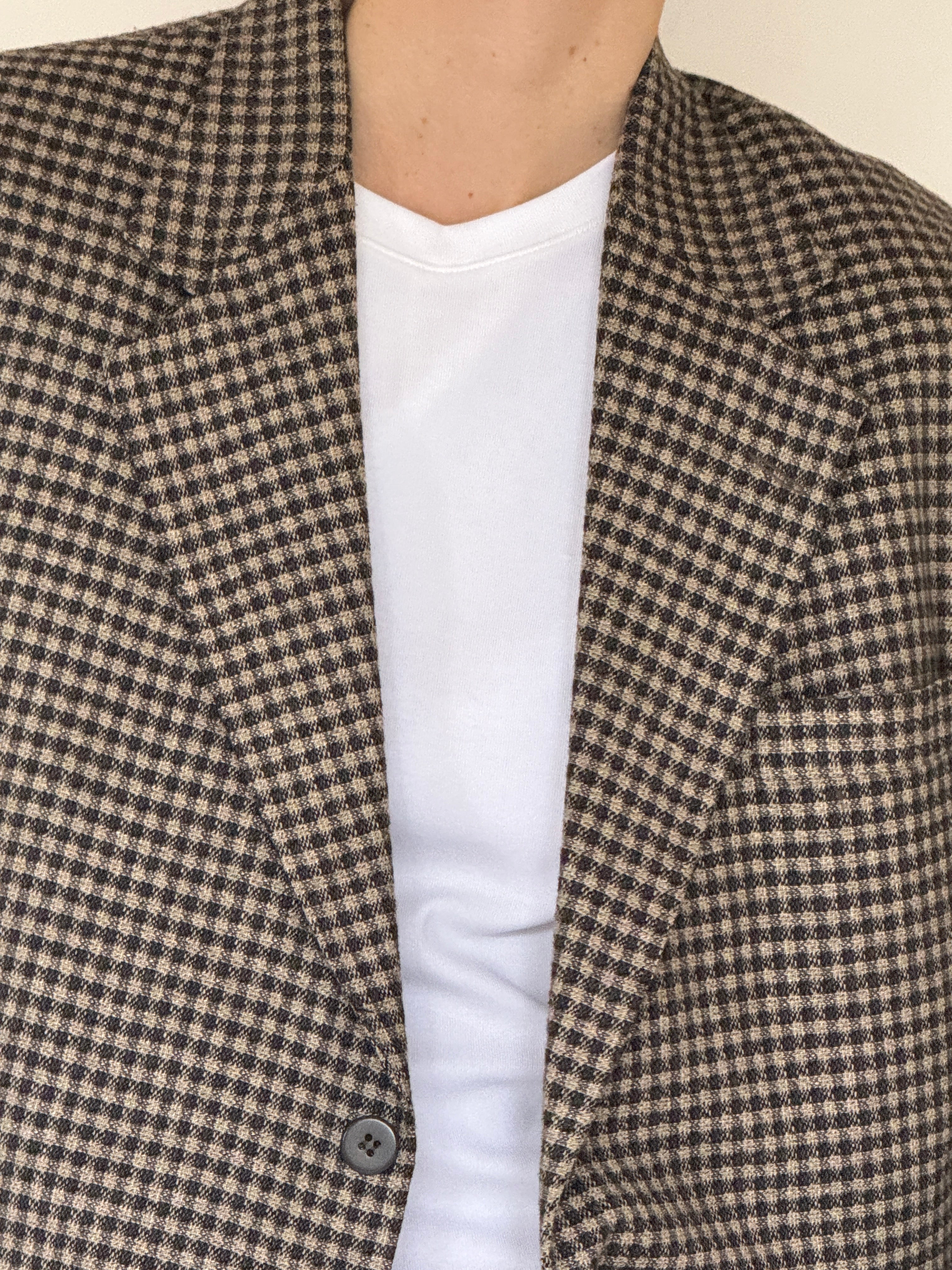 Close-up of the black and cream micro check woven fabric