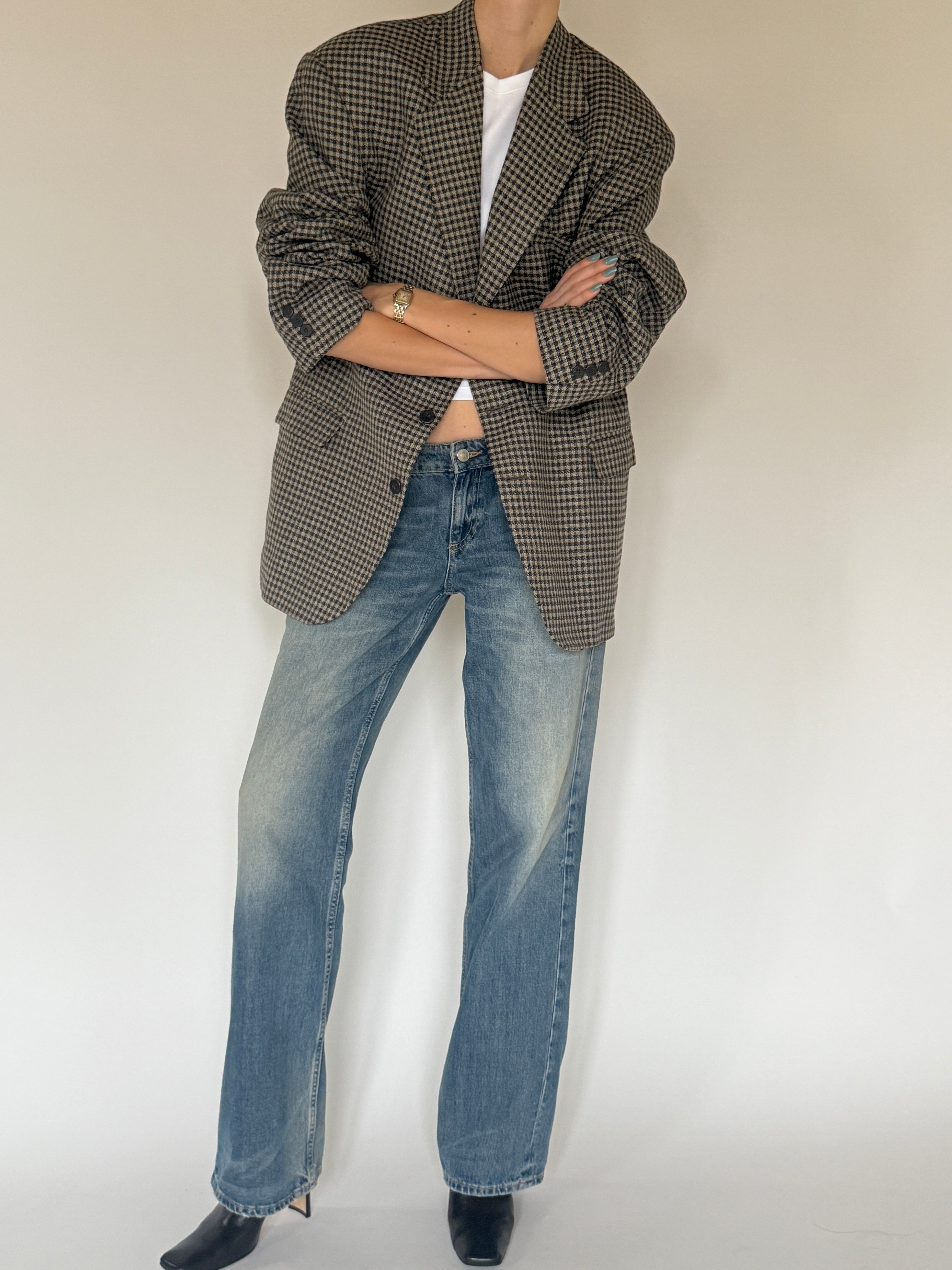intage oversized black and cream plaid blazer with a relaxed fit and timeless tailored silhouette