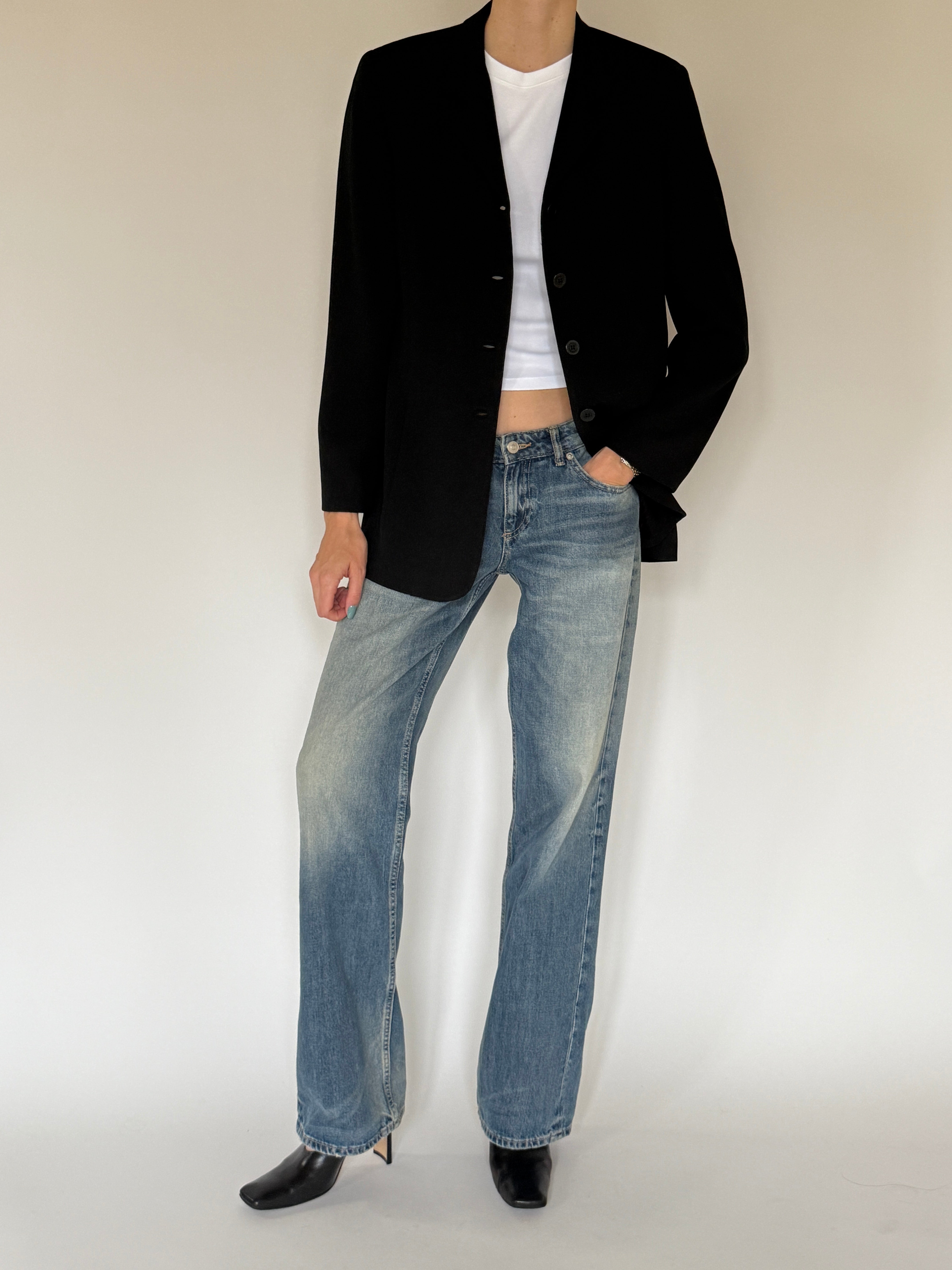 Vintage black blazer front flap pocket detail