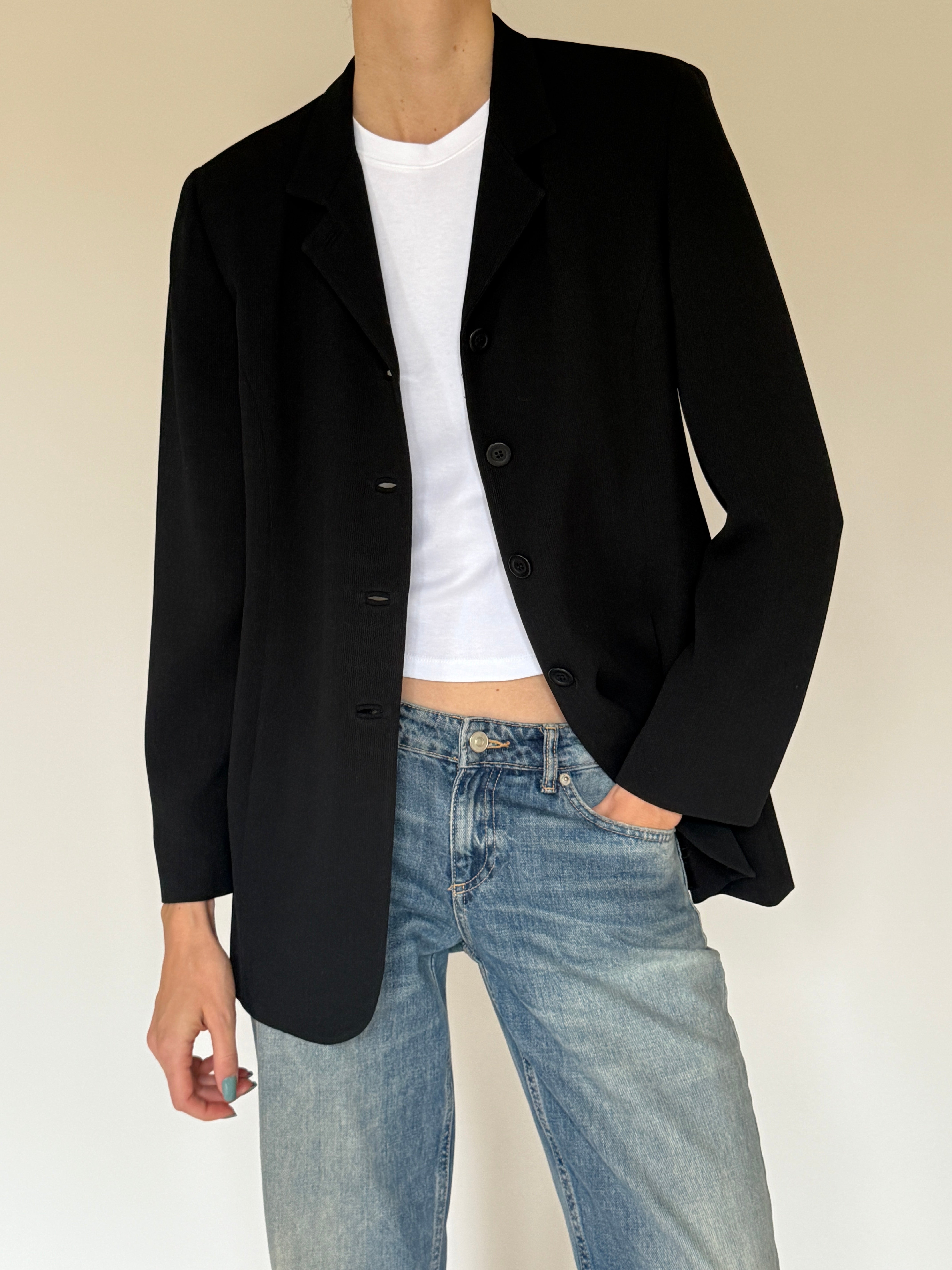 Vintage black blazer lapel close-up