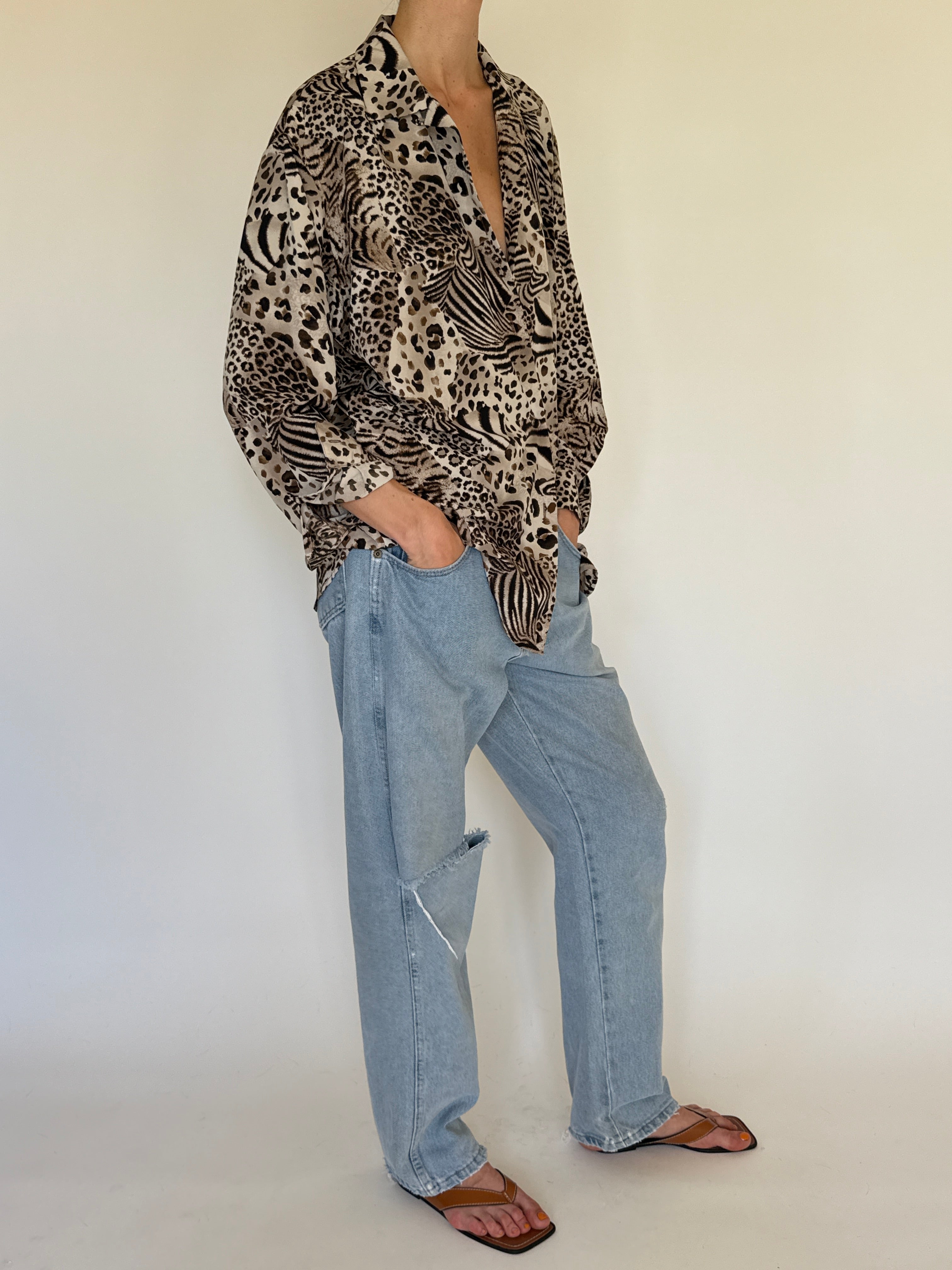 Vintage oversized animal print blouse neutral side view