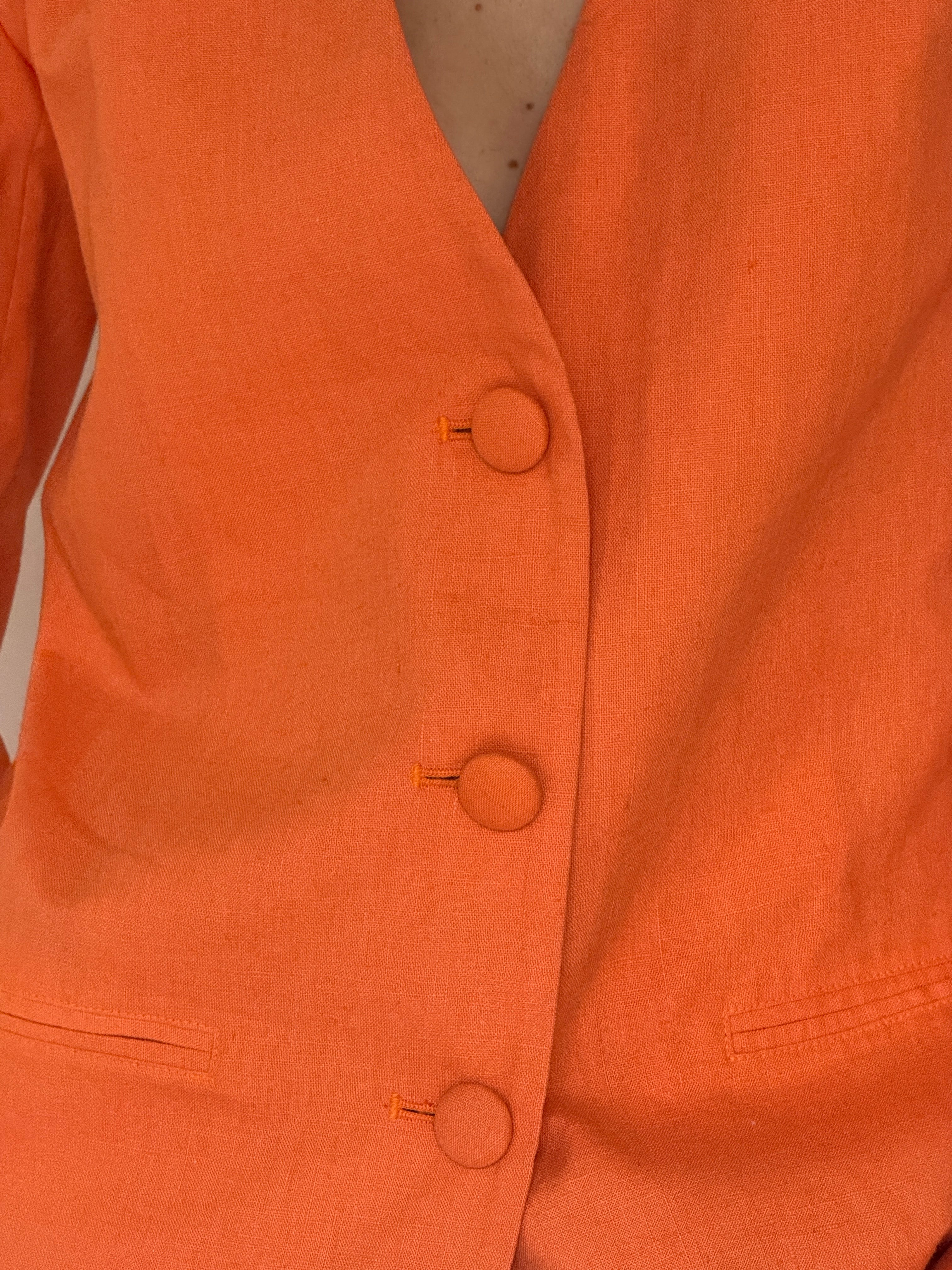 Vintage orange blazer close-up of front buttons