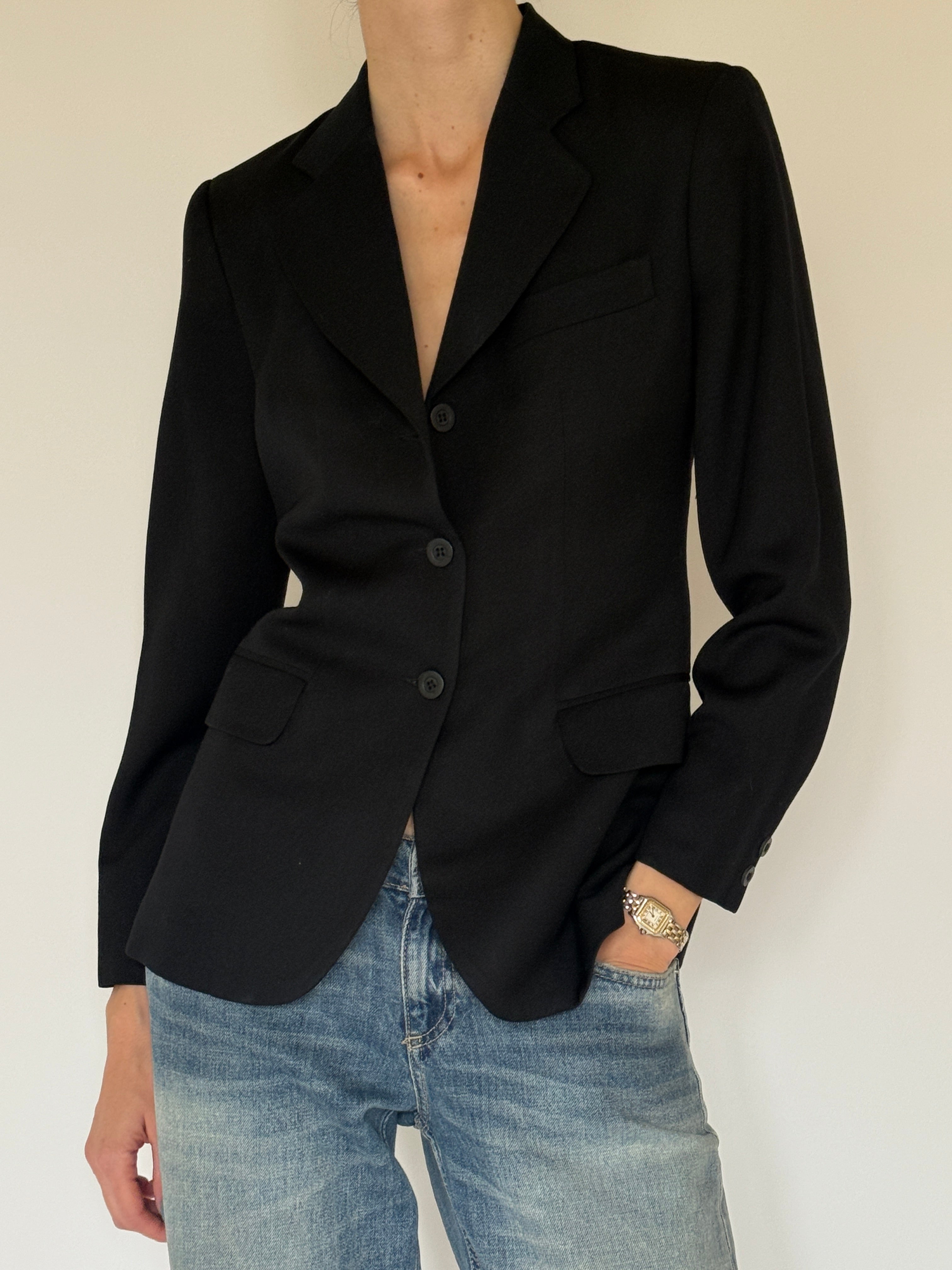 Vintage tailored black wool blazer close-up