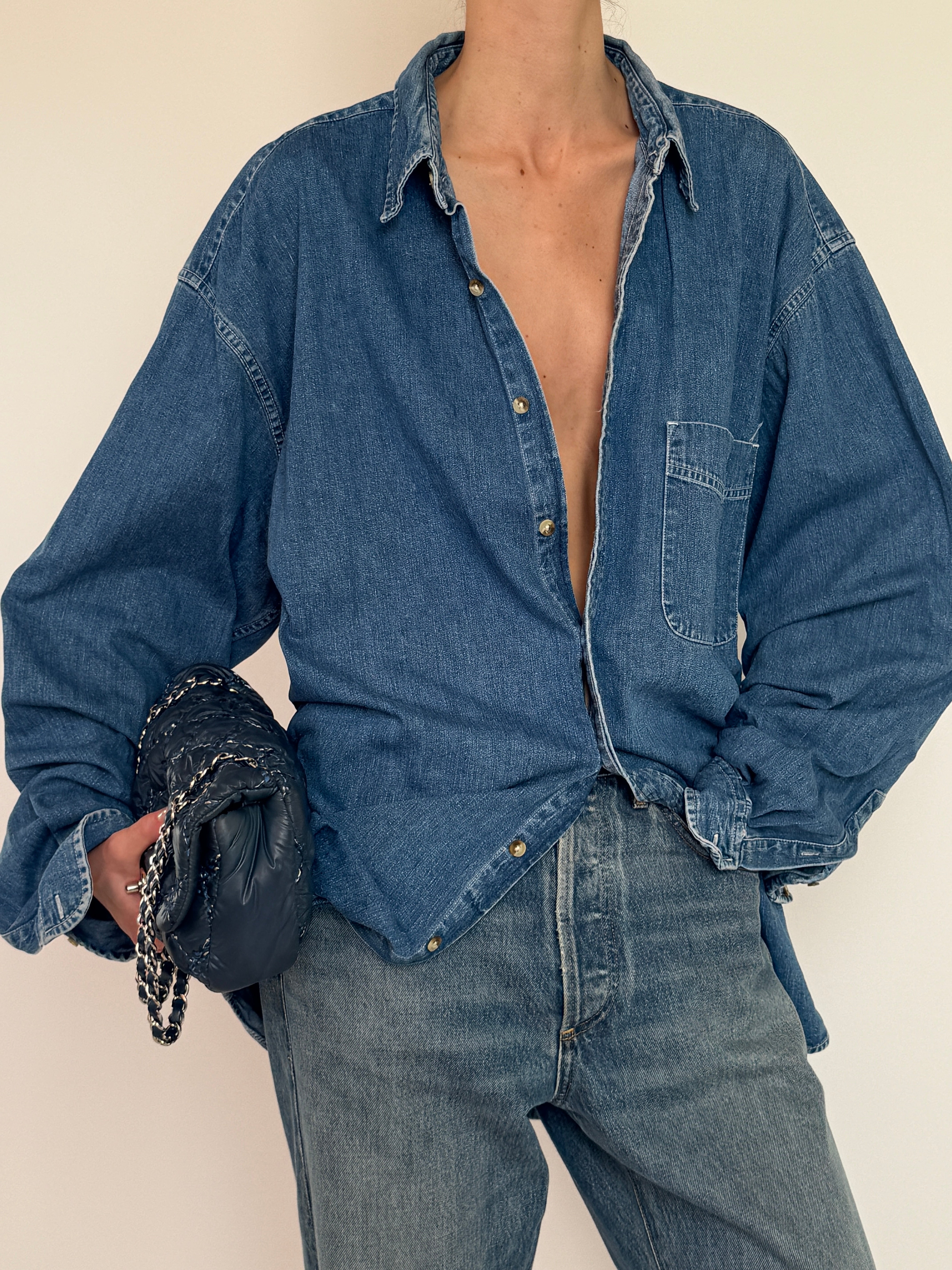Vintage blue denim button-up shirt front view