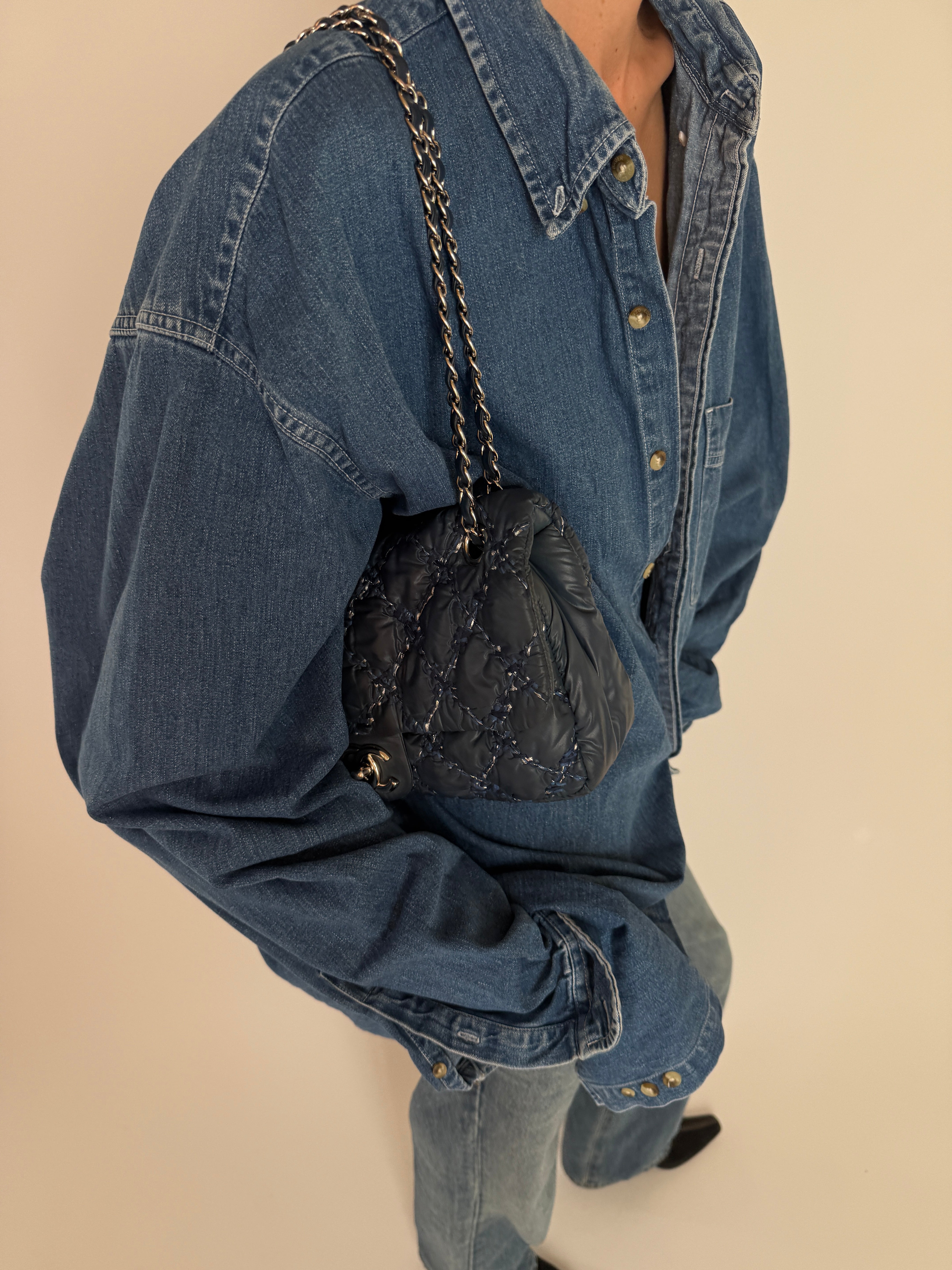 Vintage blue denim button-up shirt side view