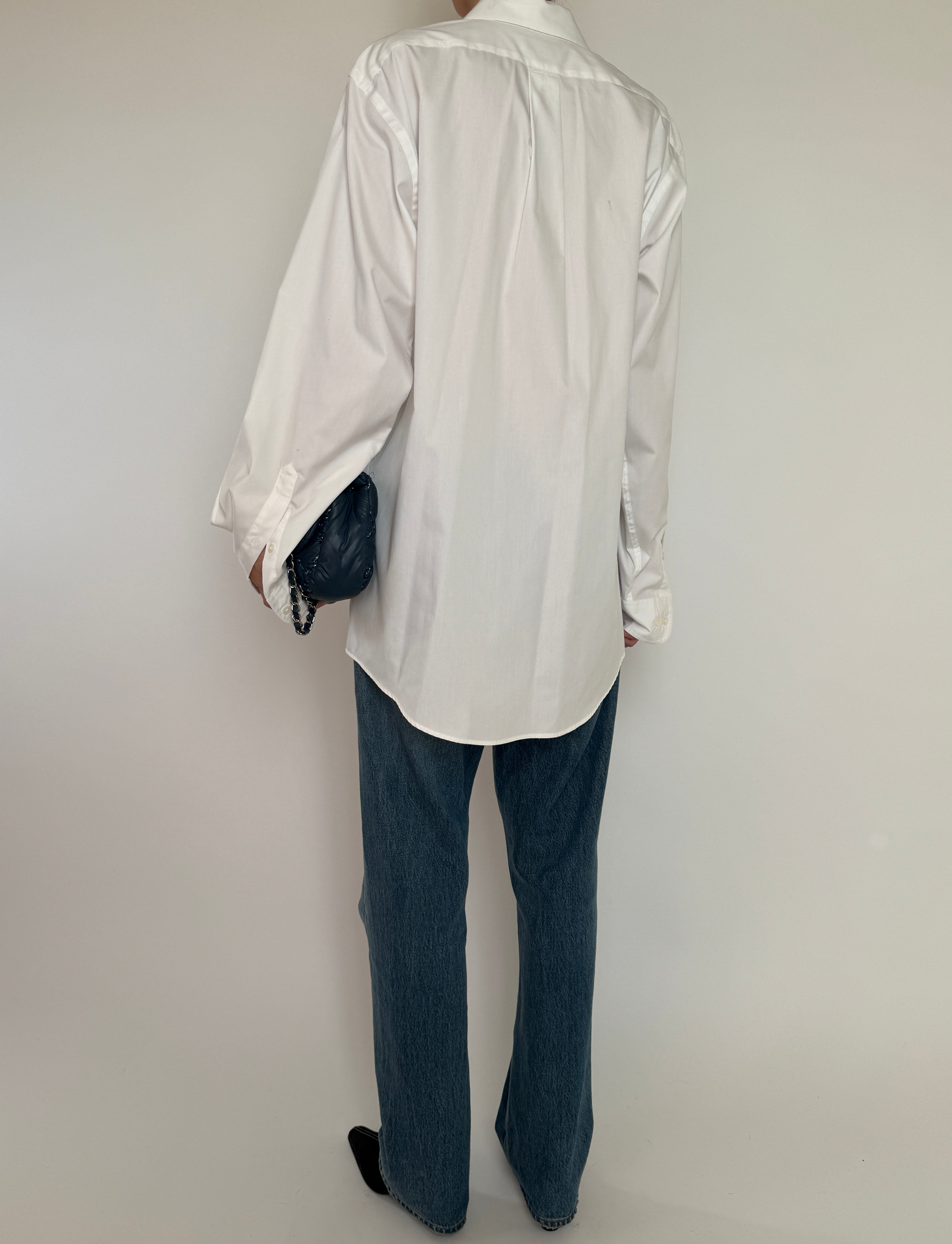 Back view of vintage white button-up shirt