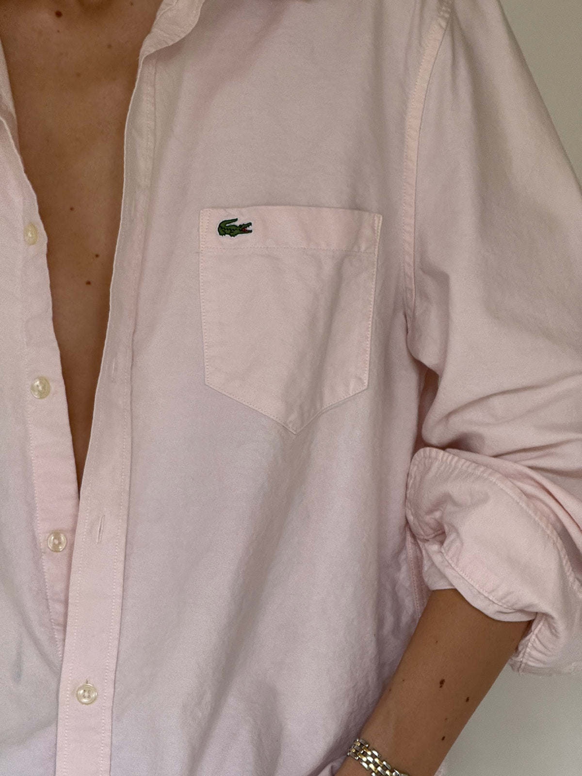 Vintage Lacoste pink cotton shirt chest pocket detail