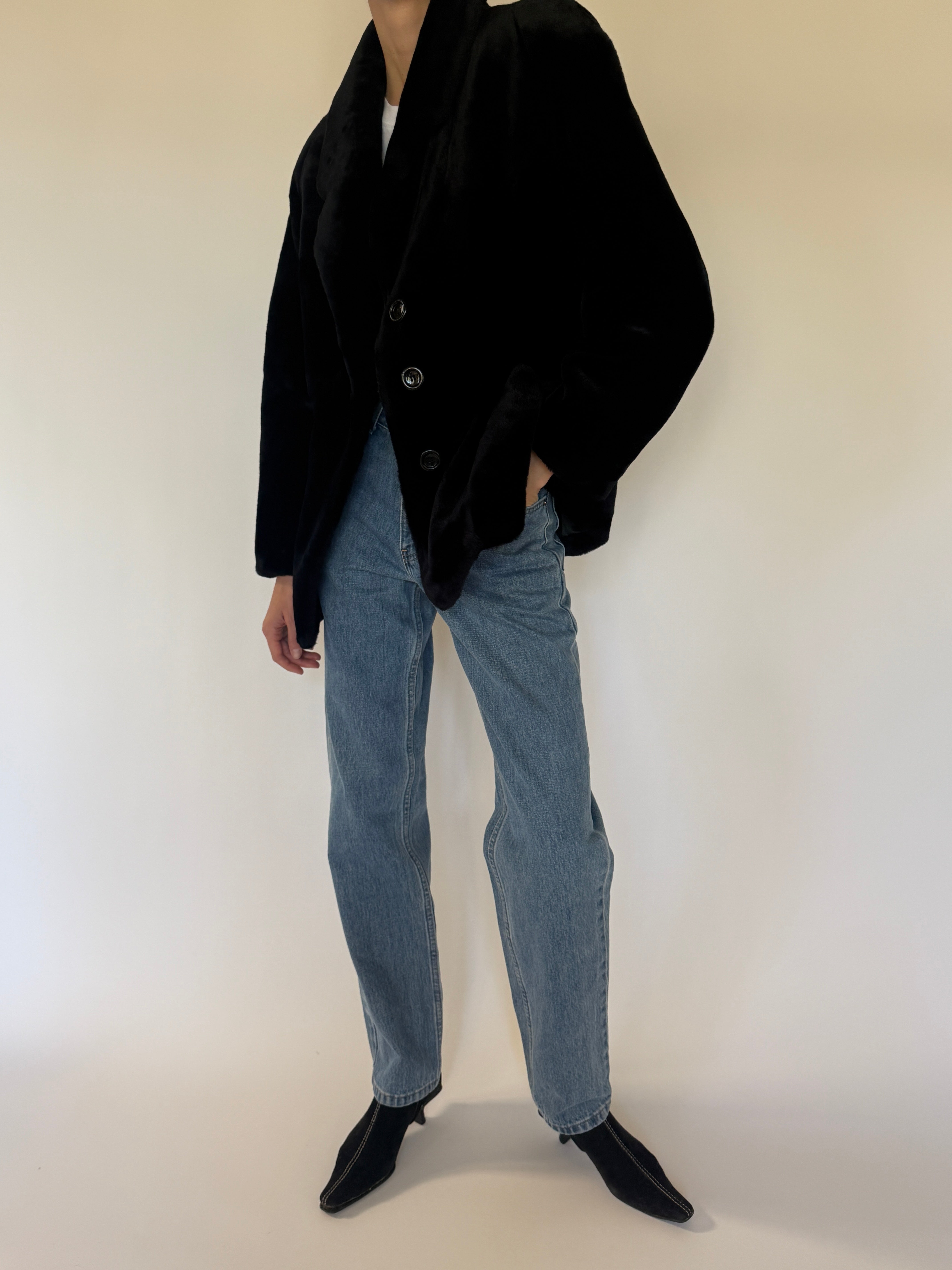 Vintage black faux fur coat side view