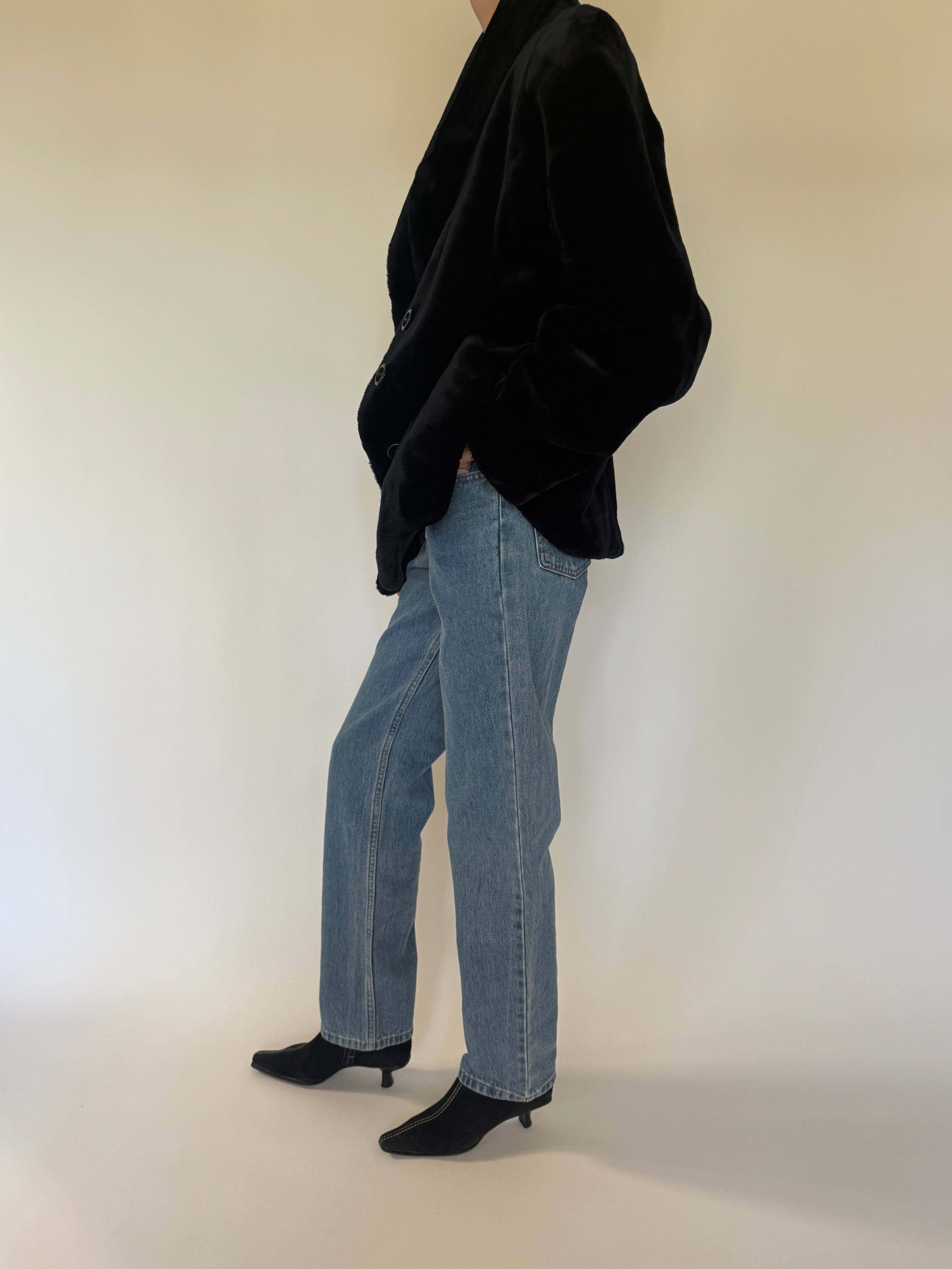 Vintage black faux fur coat side view