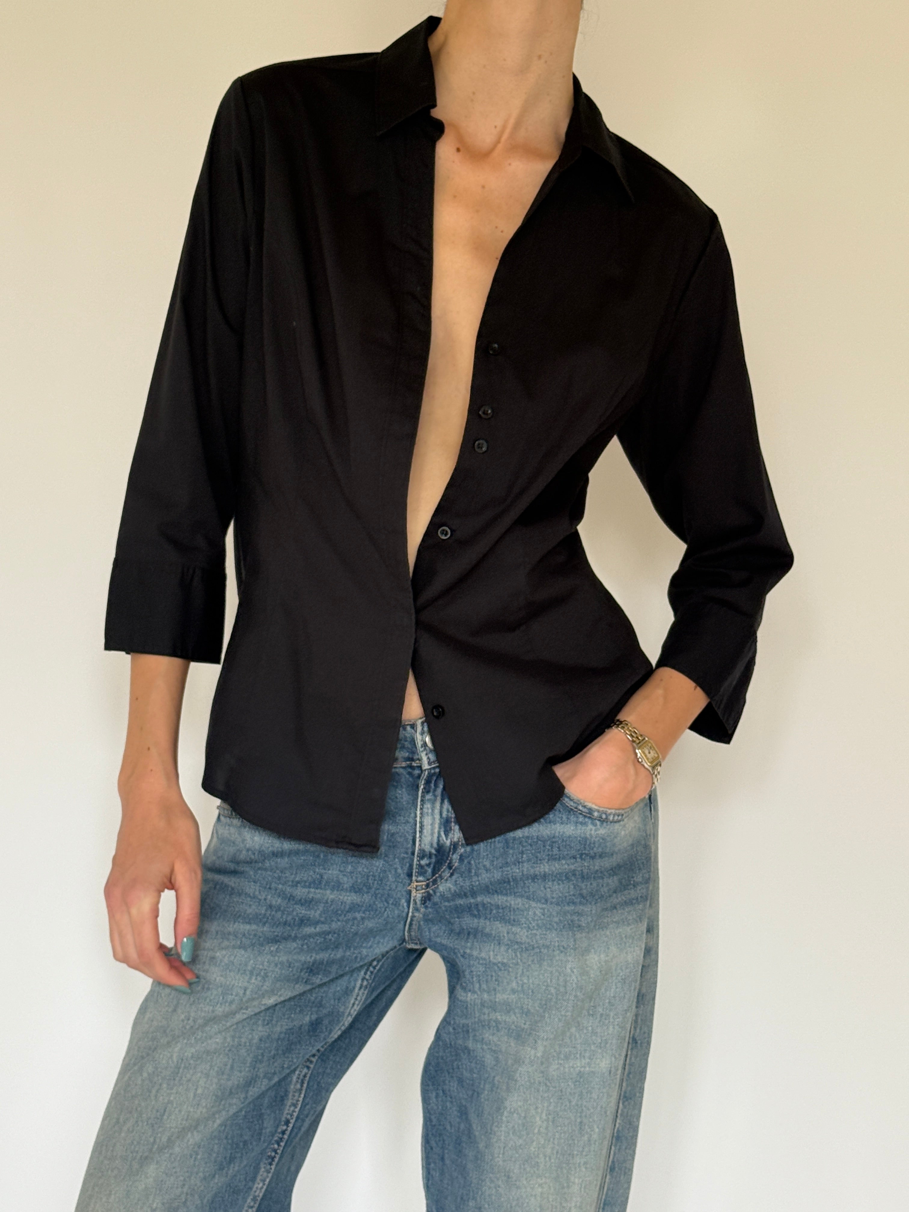 Vintage black button-up fabric close-up