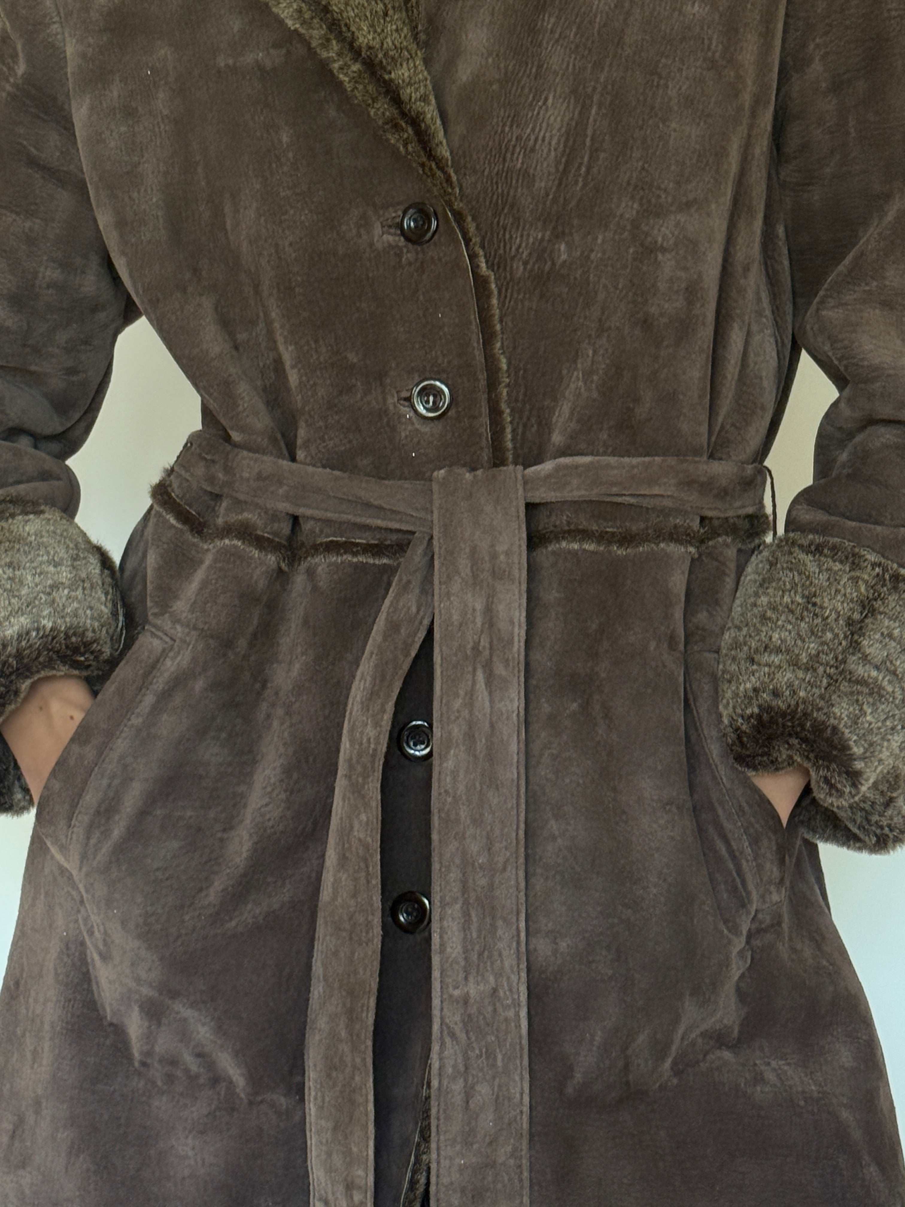 Vintage brown leather coat leather texture close-up