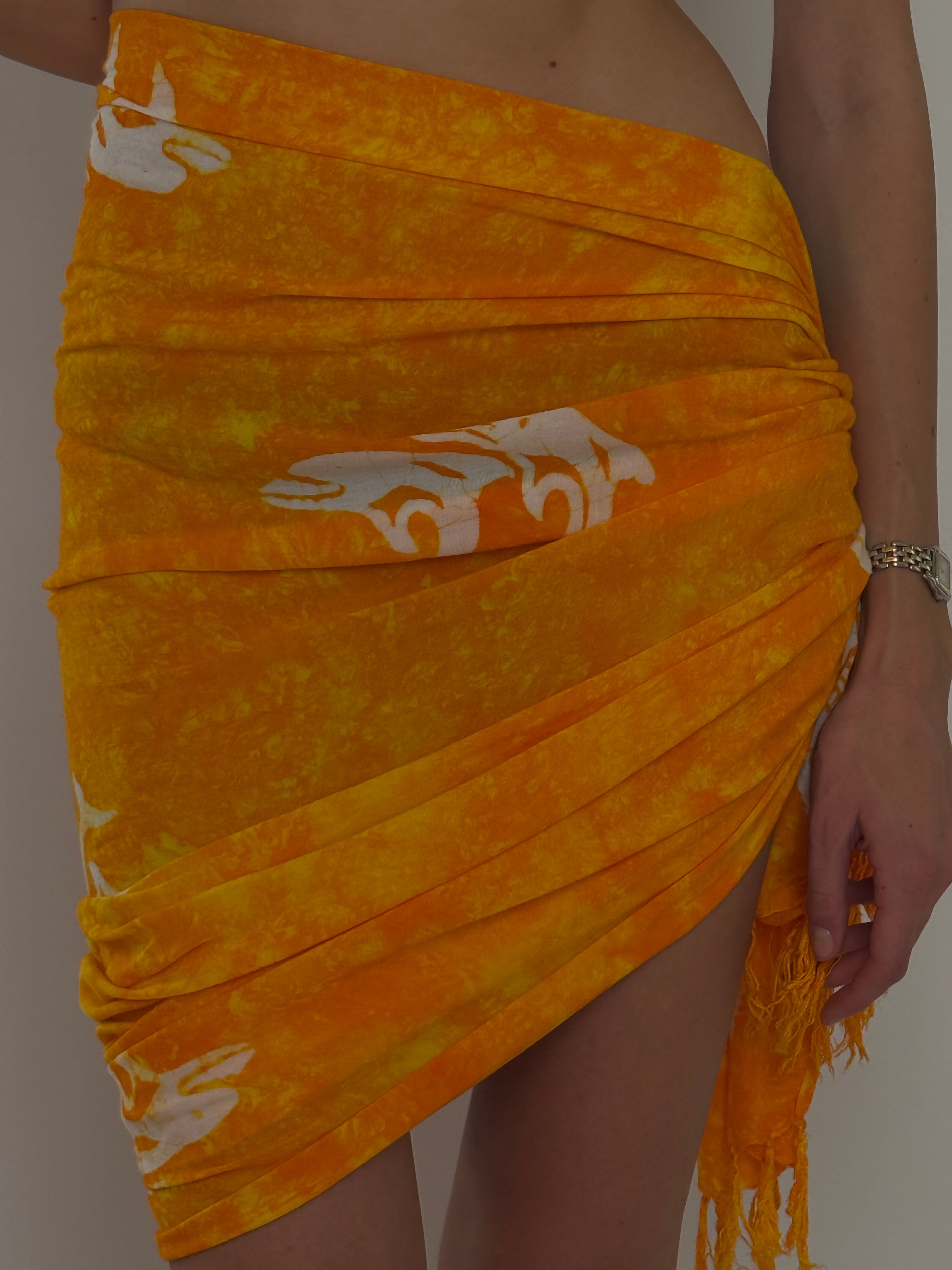 Vintage orange dolphin print wrap sarong dolphin motif close-up
