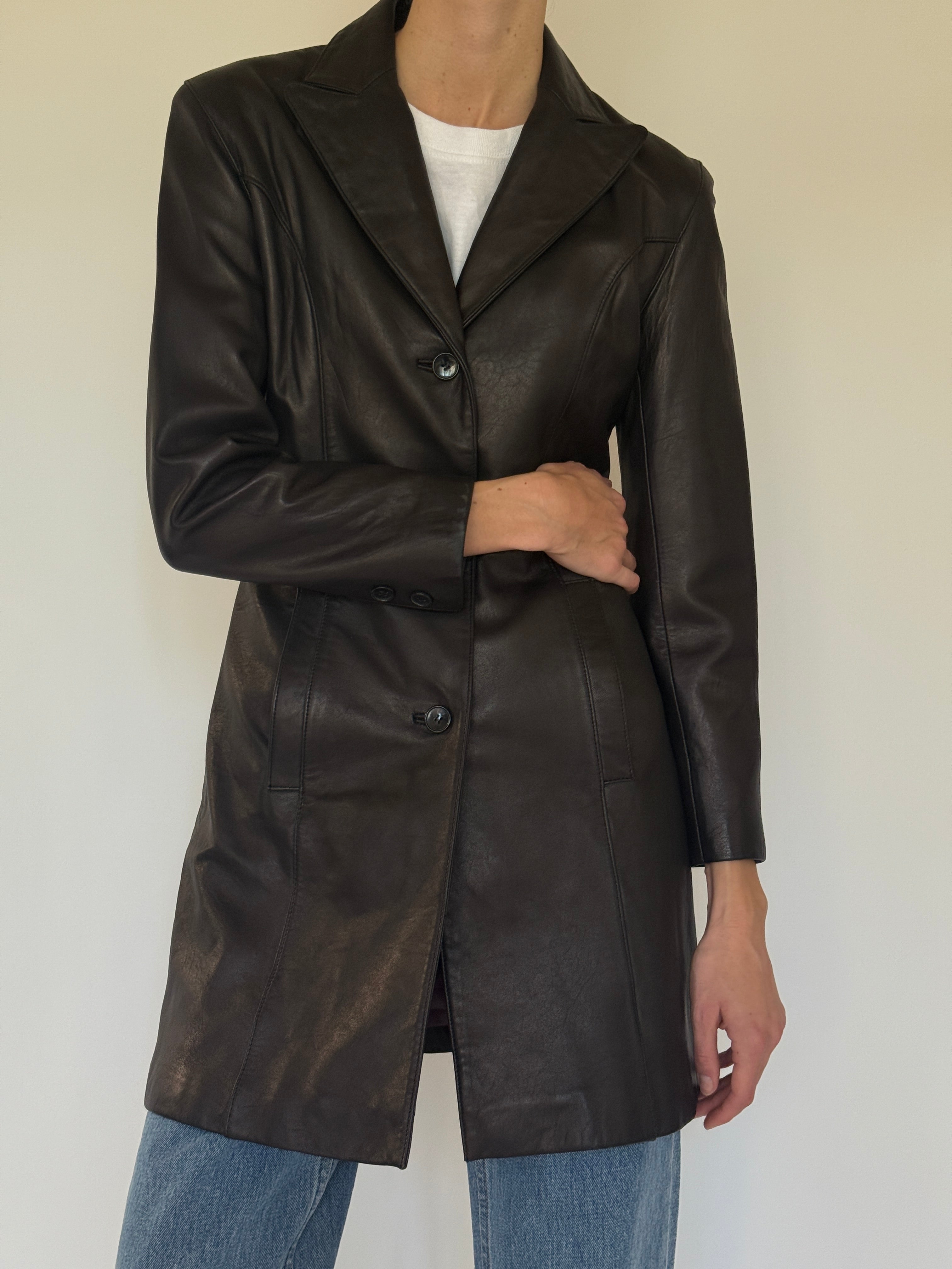 Vintage dark brown leather jacket front pocket detail
