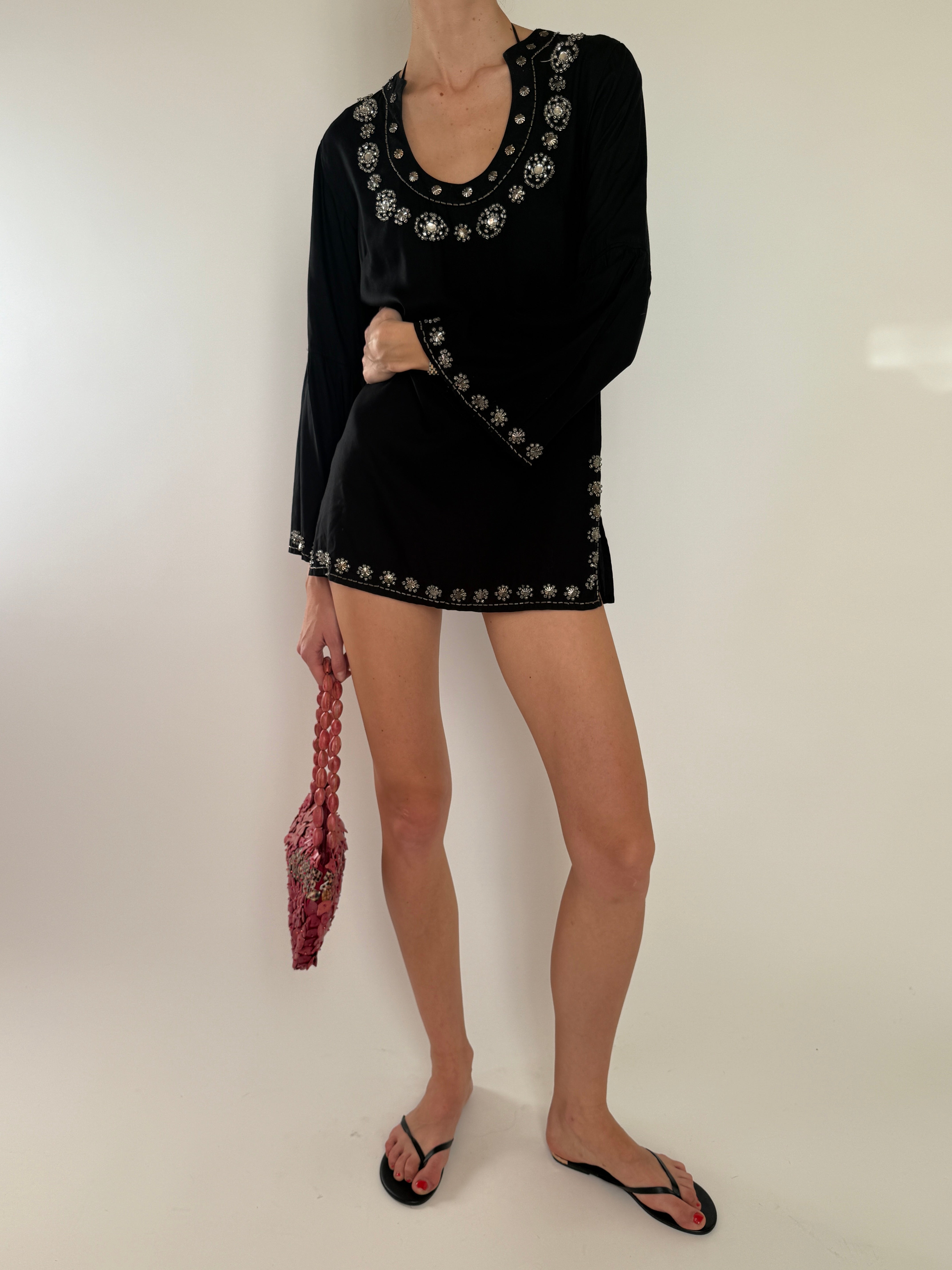 Vintage black embellished tunic dress with silver beaded neckline and long sleeves