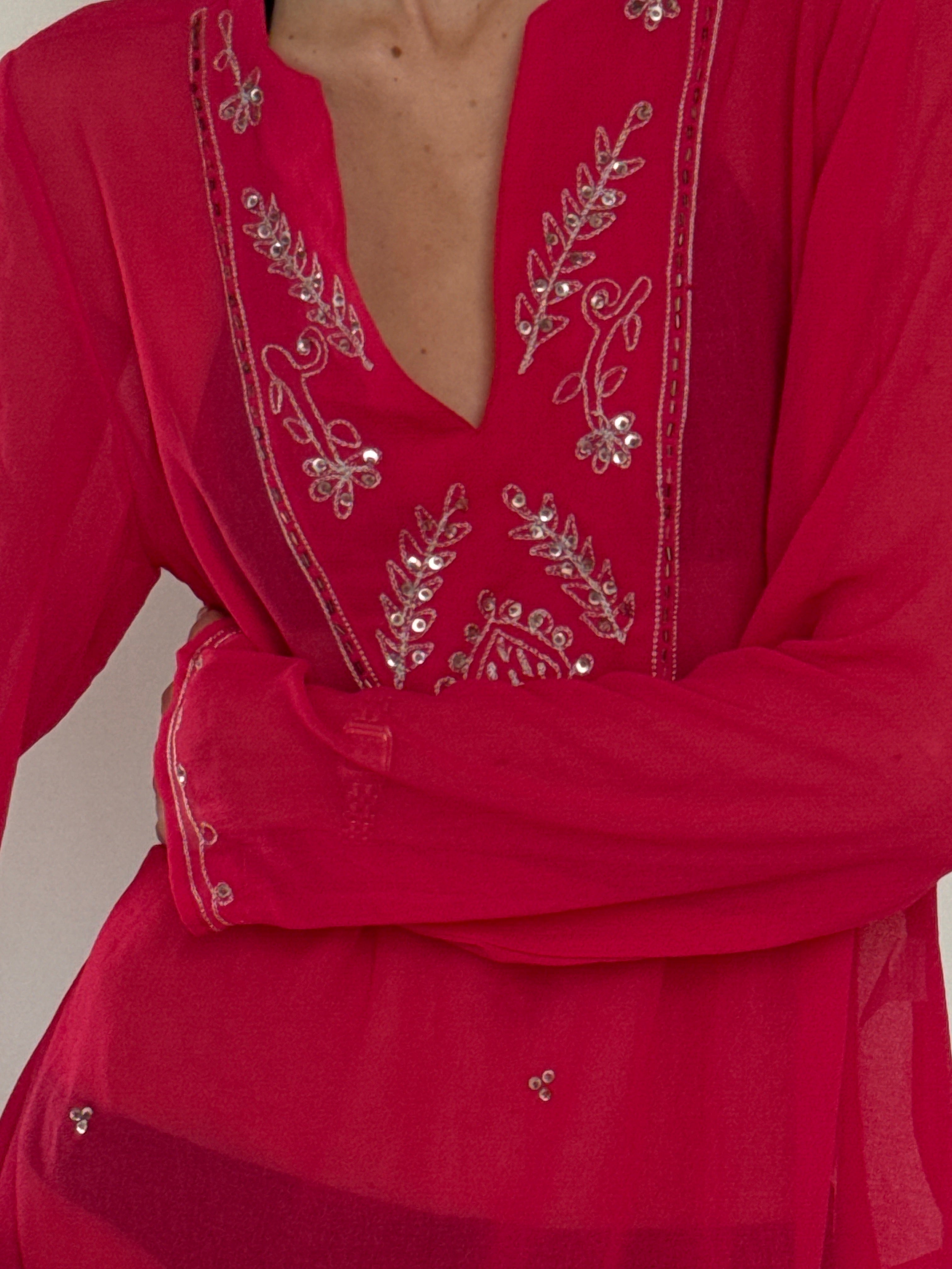 Vintage pink sheer cover-up fabric close-up