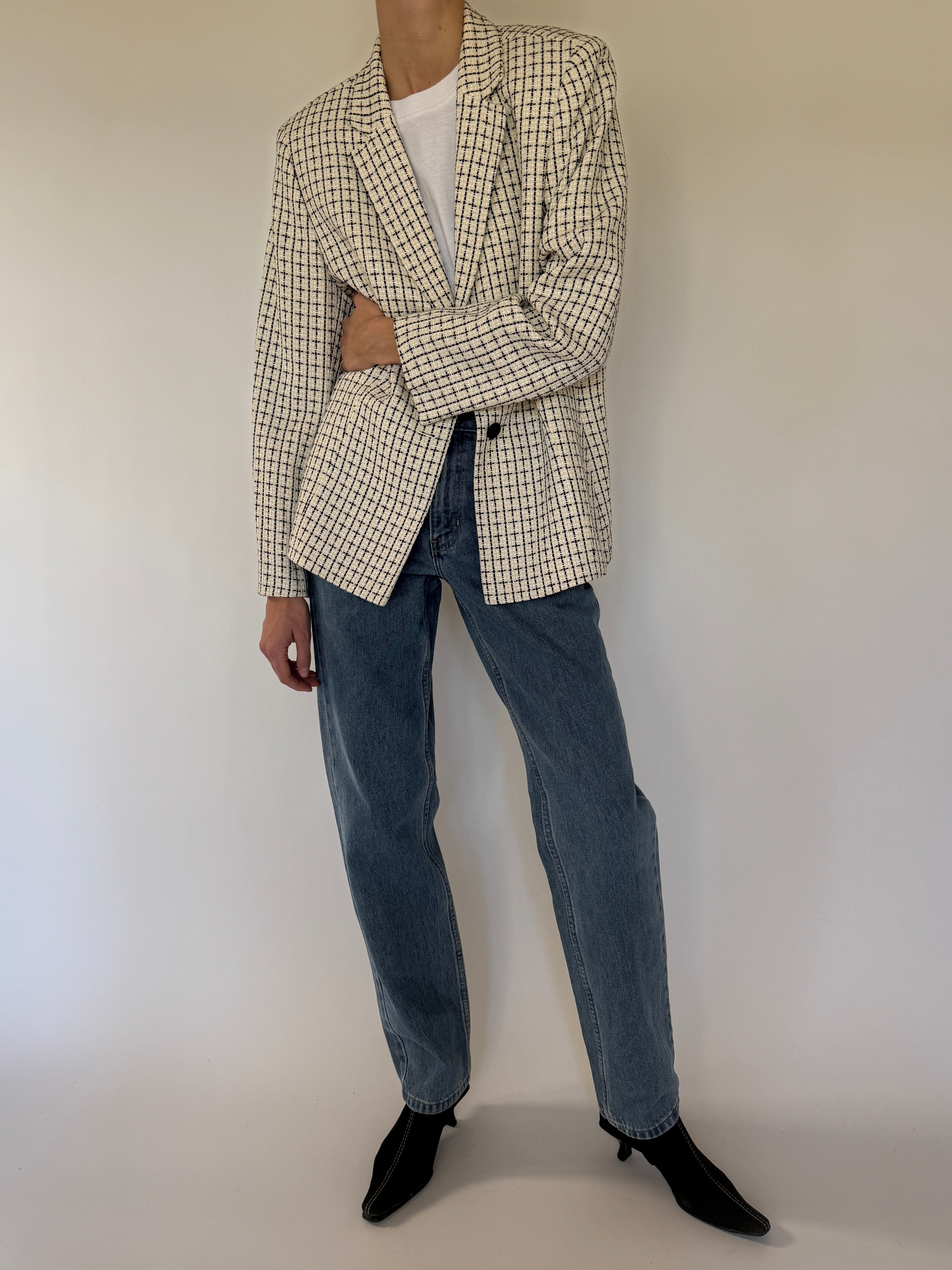 Vintage cream and black tweed blazer angled view