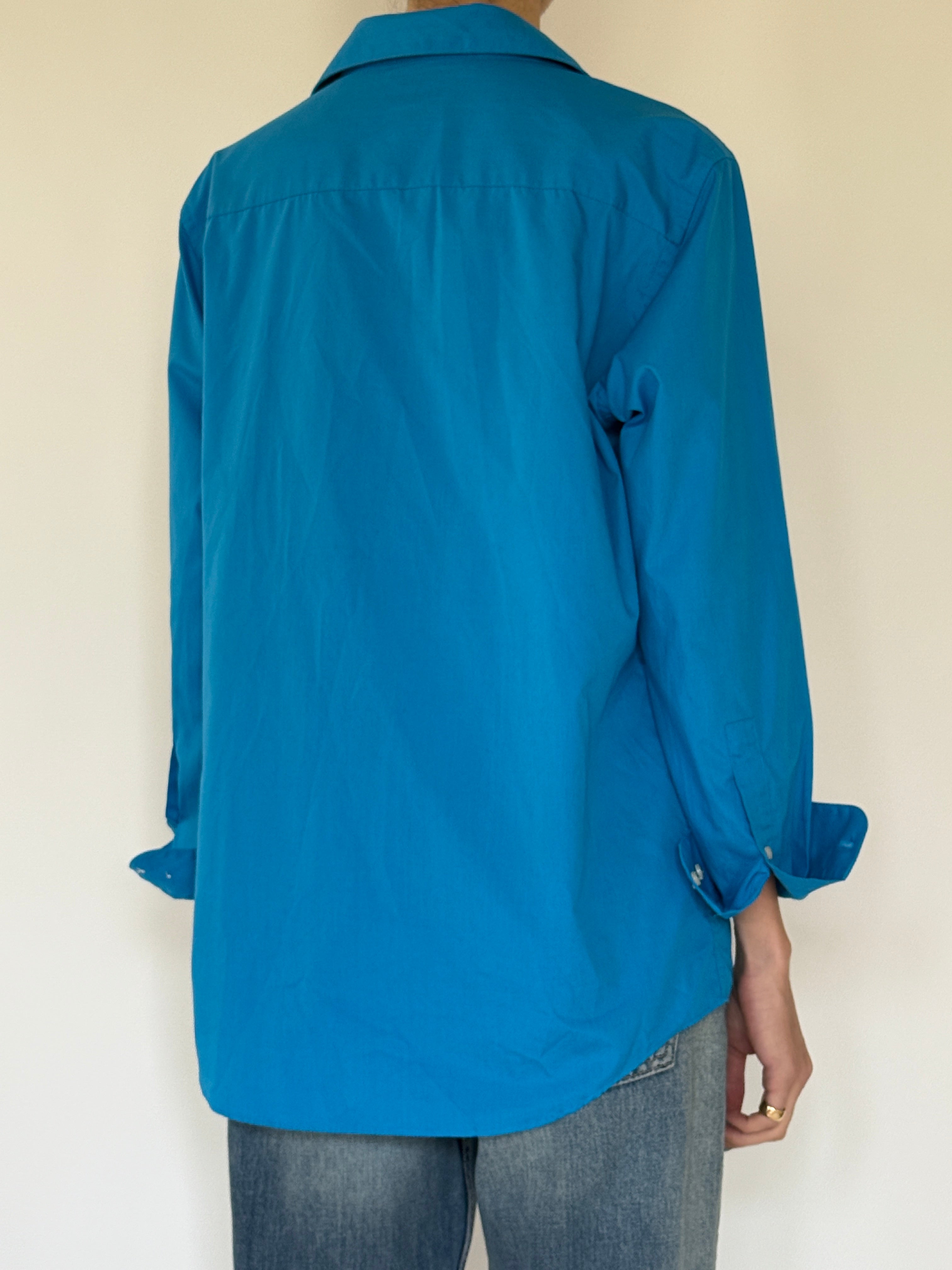 Vintage blue button-up shirt back view