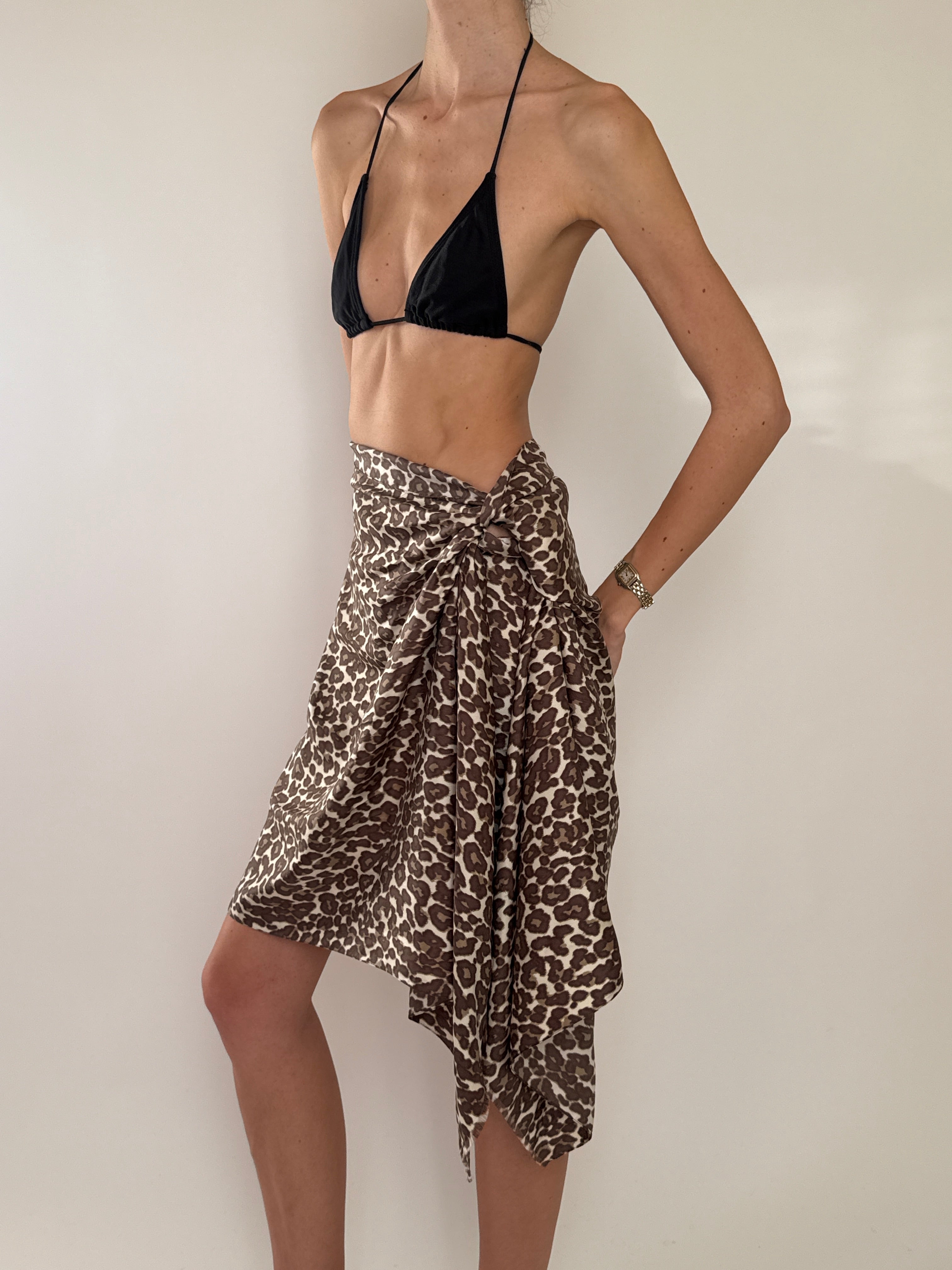 Leopard print sarong wrap showing knotted tie at waist