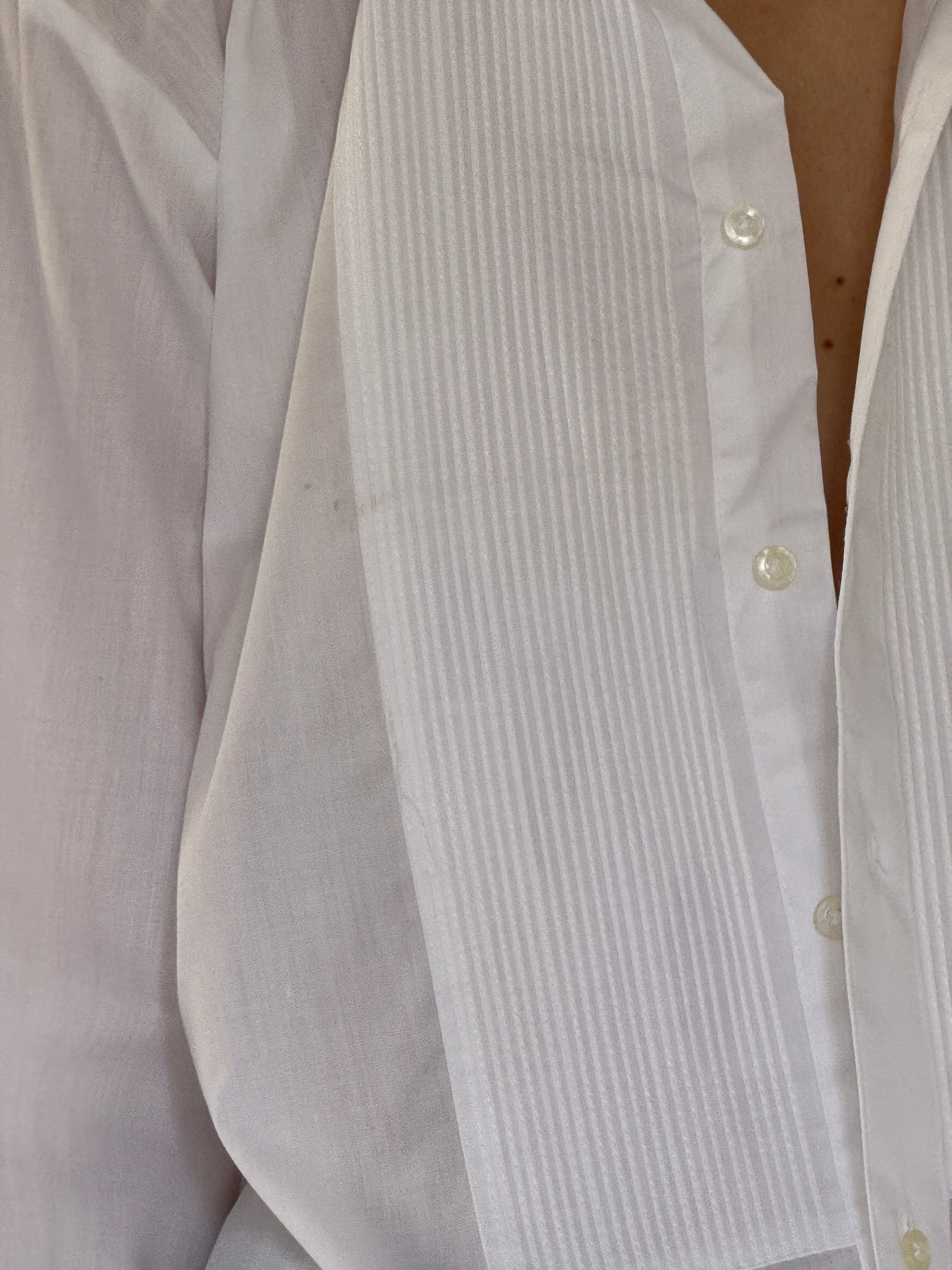 Vintage pleated tuxedo shirt close-up detail