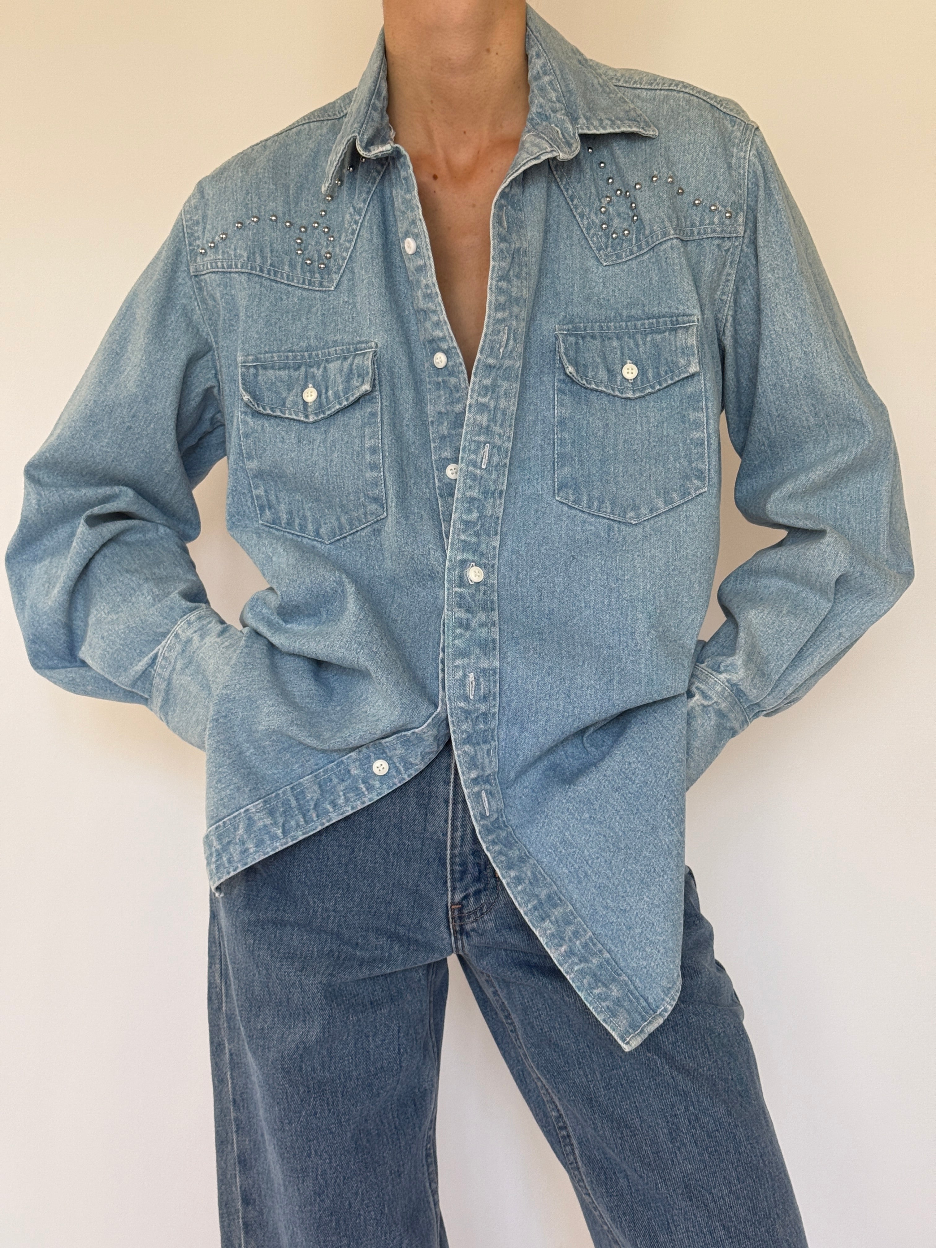Vintage blue denim shirt studded yoke detail close-up
