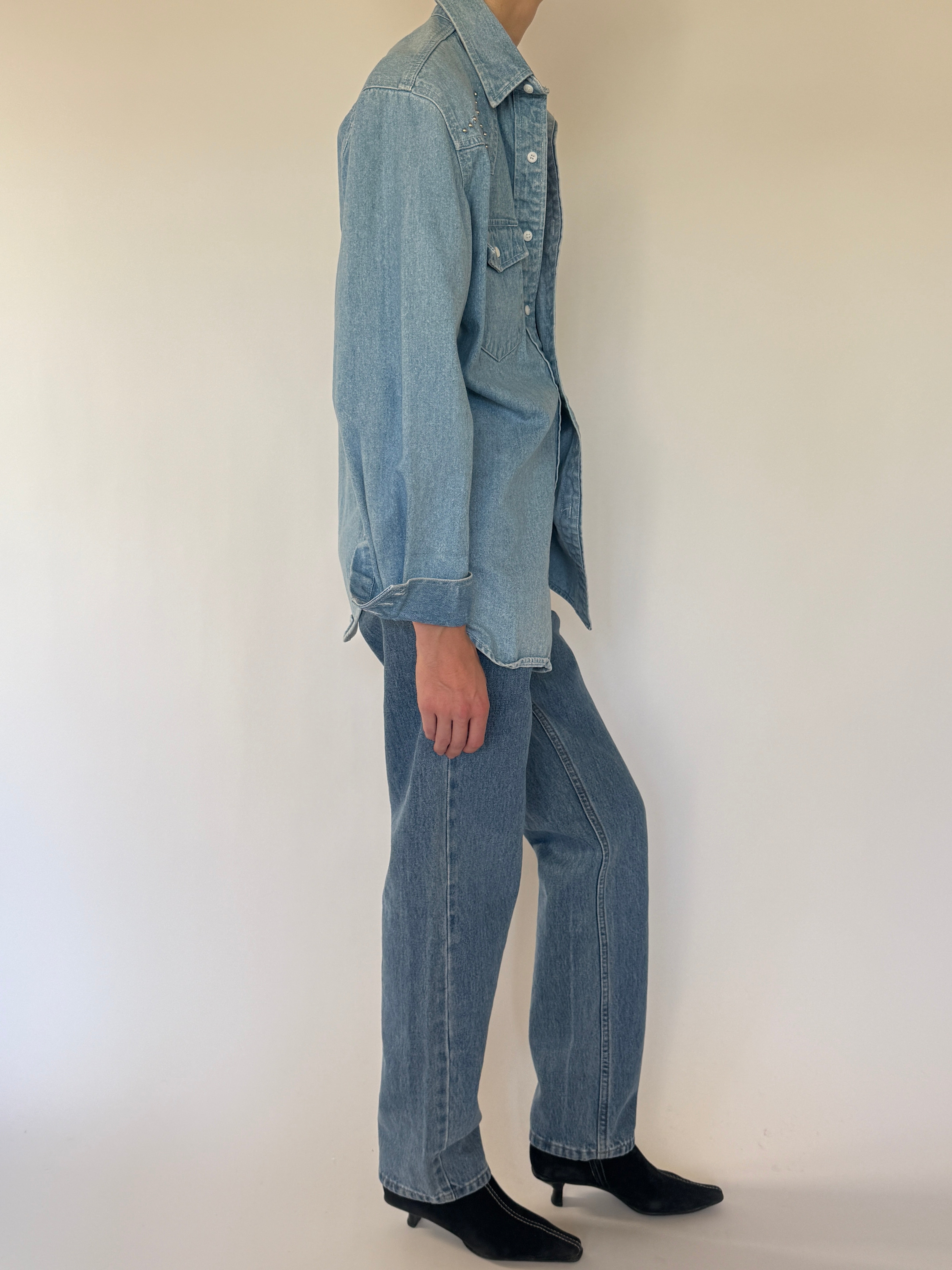 Vintage western-inspired denim shirt side view relaxed silhouette