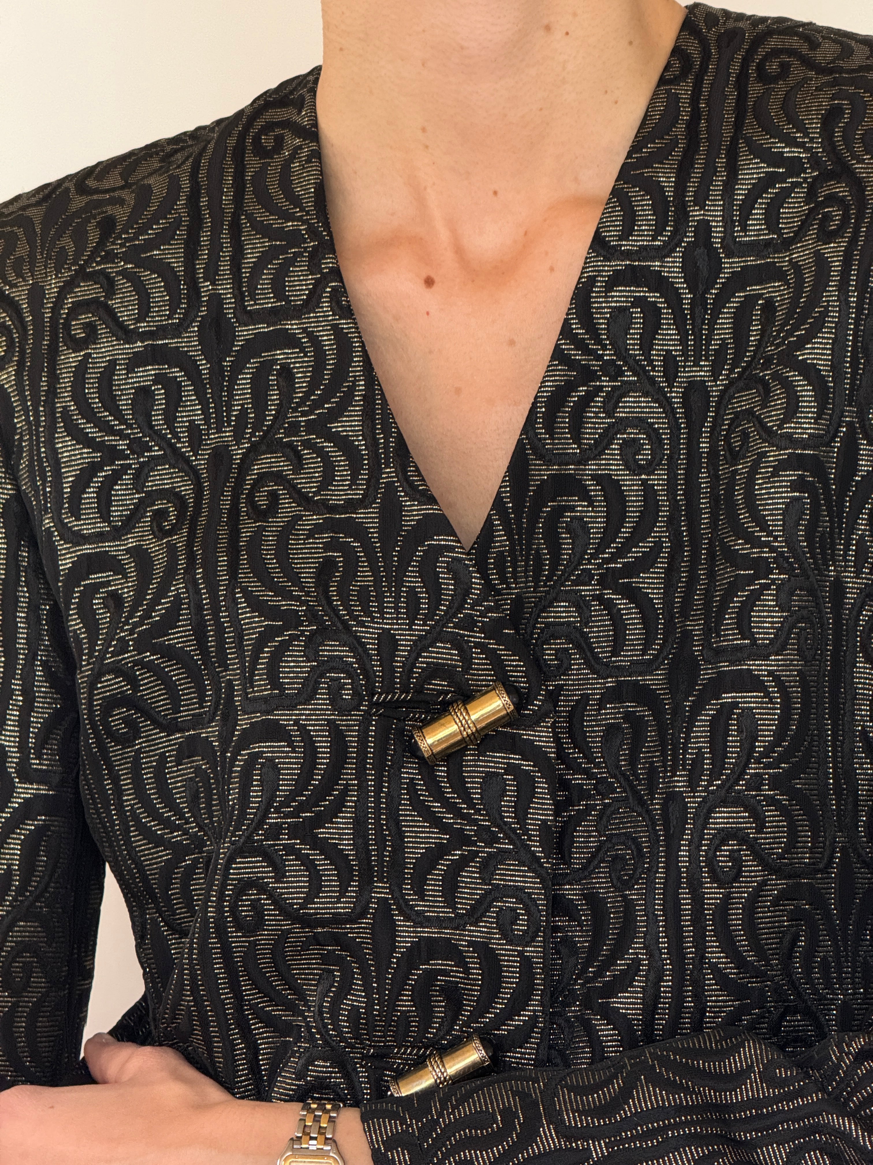 Vintage black and gold V-neck blazer close-up front view
